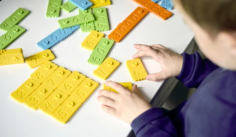 newmero_bricks_with_boy.jpg