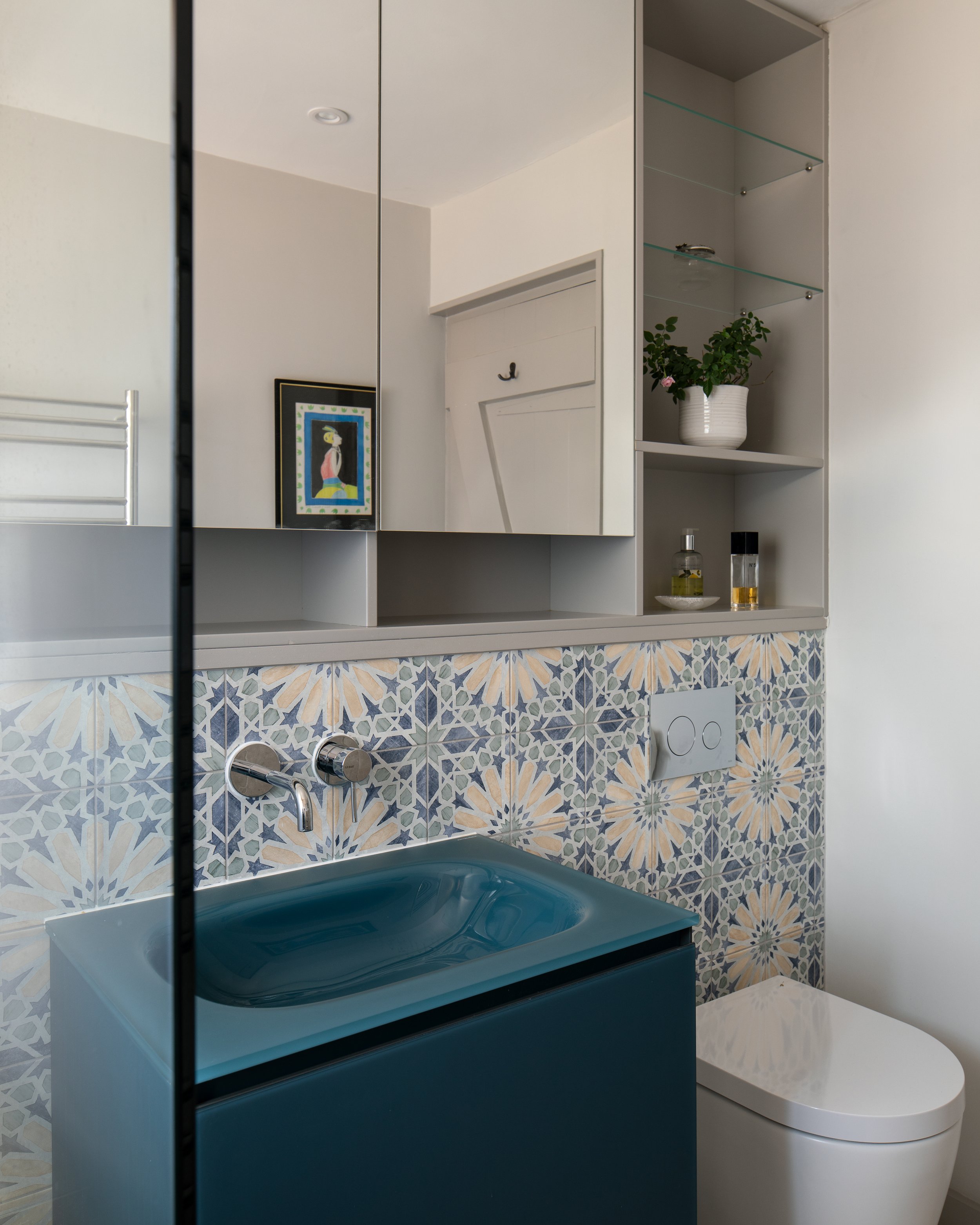 Cottage conversion blue bathroom with bespoke cabinetry.jpg