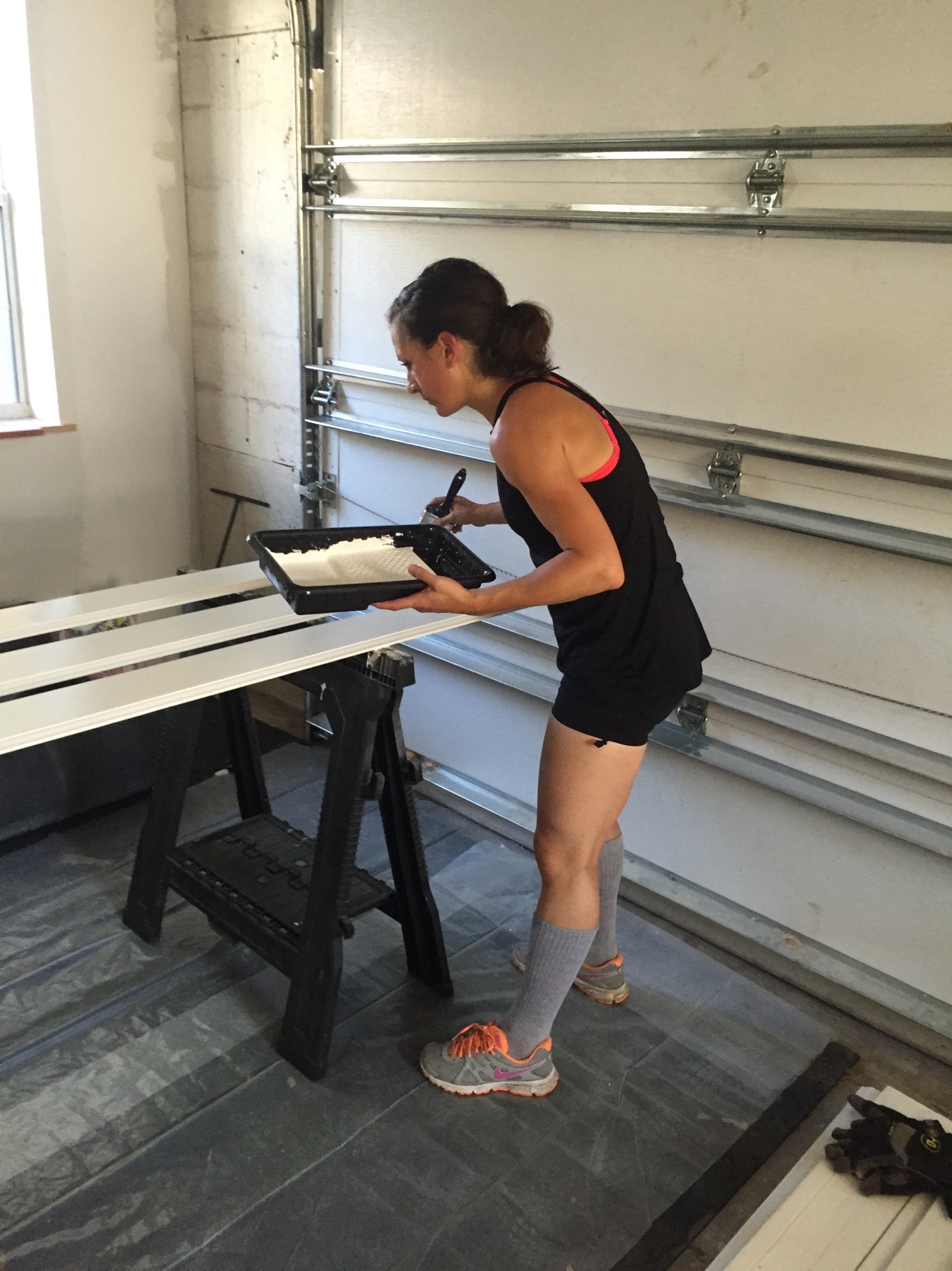 Courtney in the baseboard painting zone! 