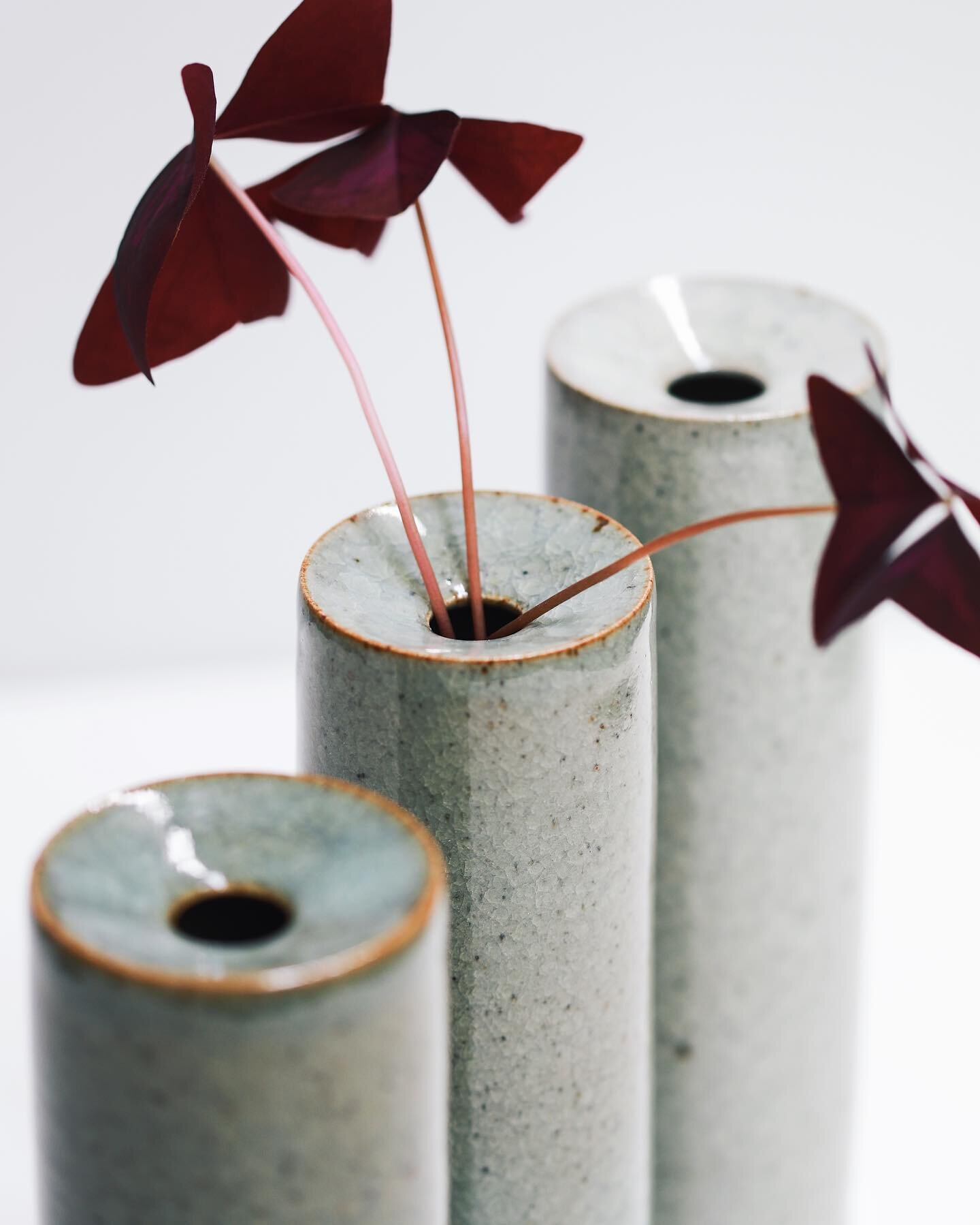 Three tall bud vases covered in my white, pale green and my darkest green crackle glazes. Fired in my gas kiln for nine or so hours to 1290&ordm;c, or for the potter&rsquo;s reading, I try to put cone 10 flat. 

The first 4 hours of the firing I just