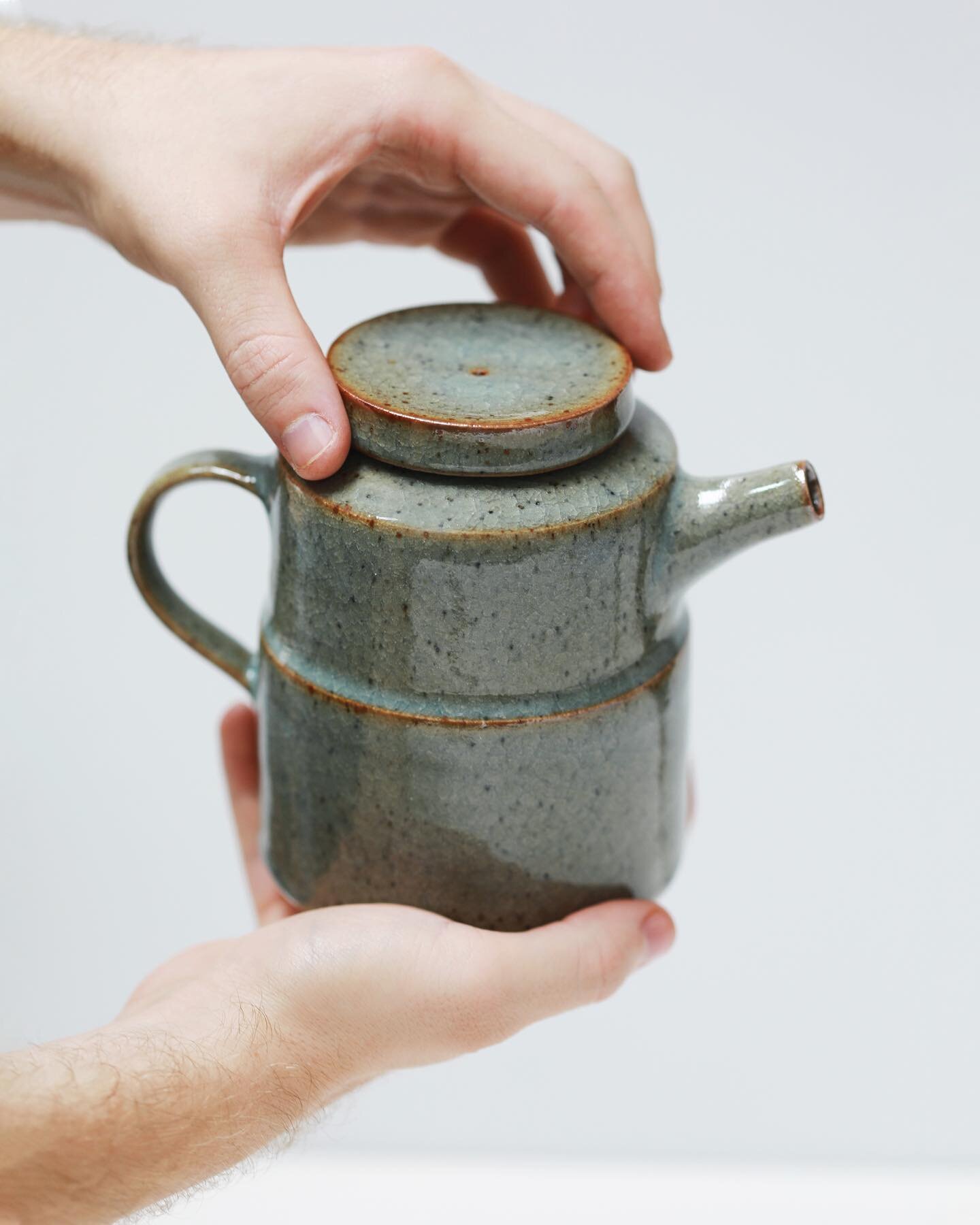 A new teapot, gas fired in a reduction atmosphere to 1295&ordm;c with ledges and sharp edges surrounding the vessel for the glaze to break over, revealing the brighter orange tones of the iron rich clay beneath.

The little pierced hole in the lid is