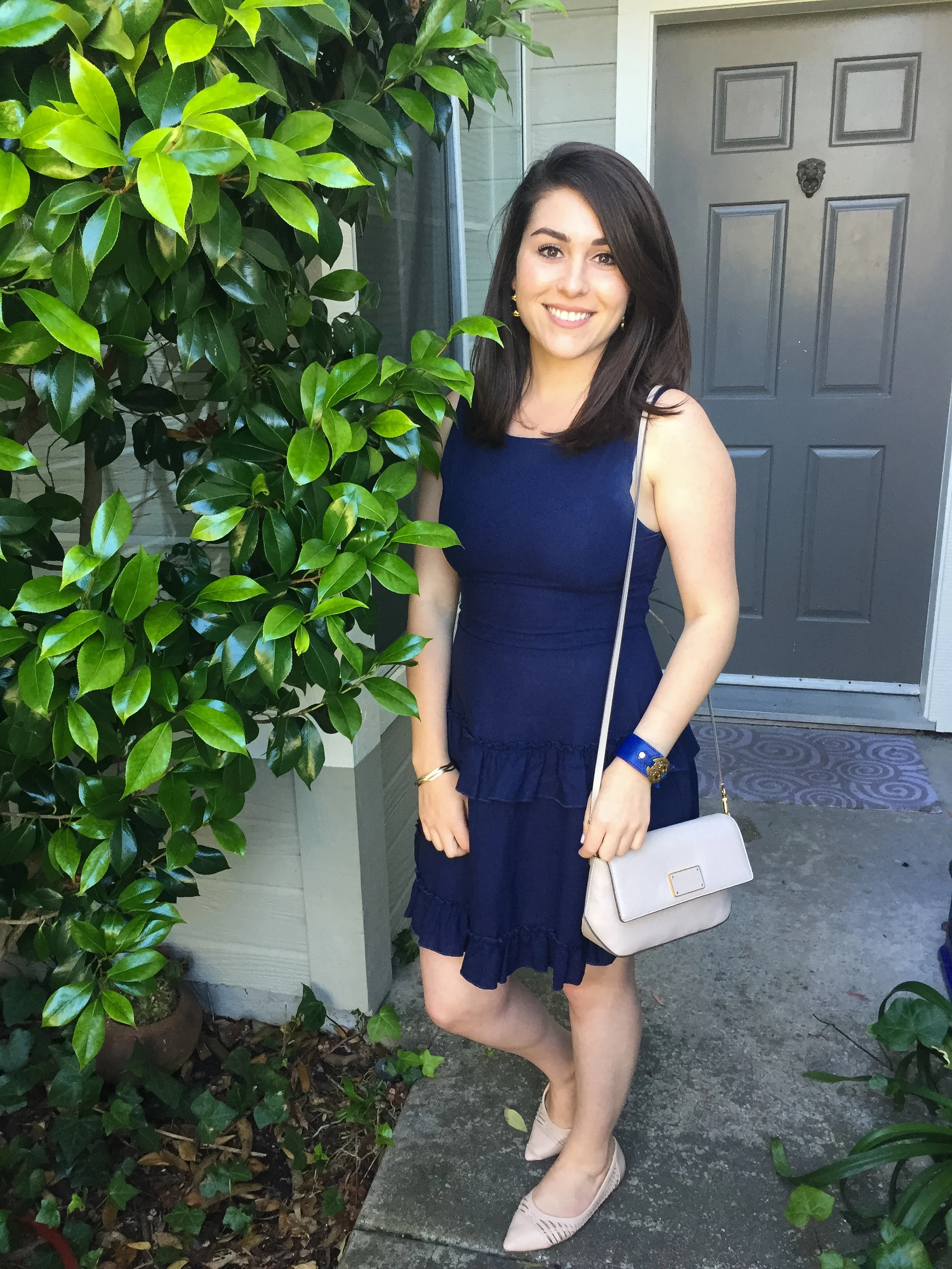 Denim dress from Nordstrom Rack with neutral flats from Express, a Marc by Marc Jacobs crossbody bag and a blue Tory Burch bracelete