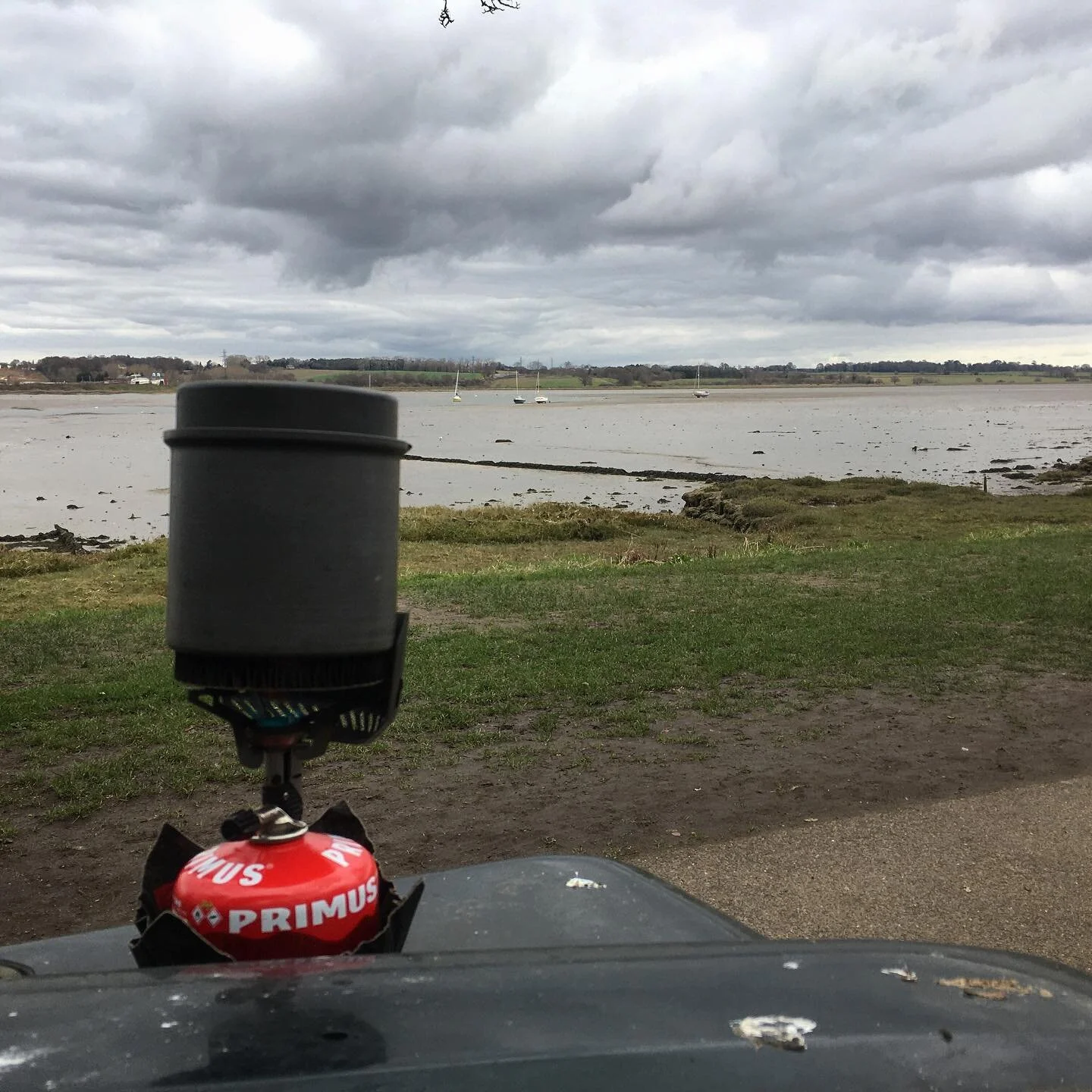 Primus stove and the wing of a Landrover - made for each other! I wonder how many fabulous adventures this intrepid duo have had together? #primus #landrover #adventure #skillsforlife #defender #campingstove #mistlywalls #stourestuary