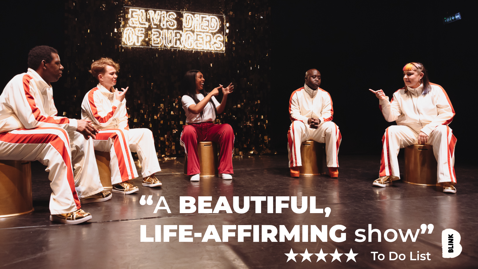 The ELVIS DIED OF BURGERS cast sit in a circle, talking to each other. Text reads 'A beautiful, life-affirming show. 5 Stars. To Do List.'