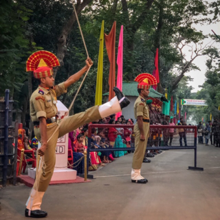 Indian border soldier in flag lowering ceremony.