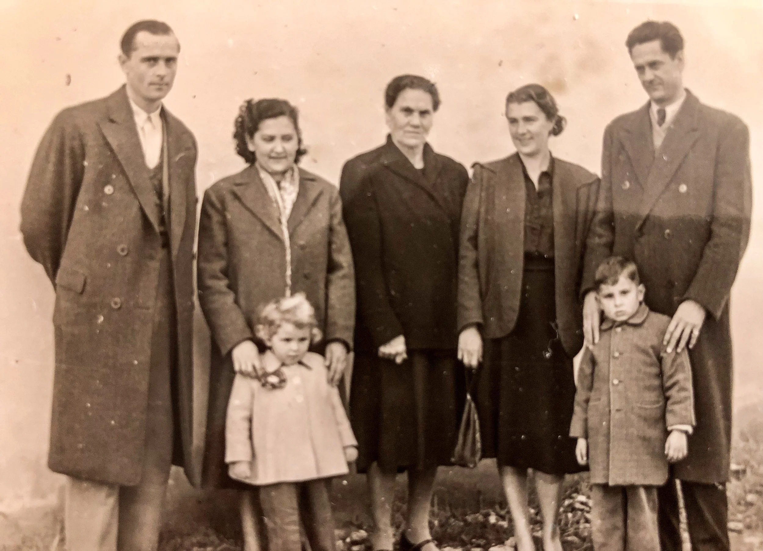 Last picture in refugee camp before my Aunt Galya and Uncle Shura—on the right—left for America in December of 1952. My Grandmother Daria is in the middle.