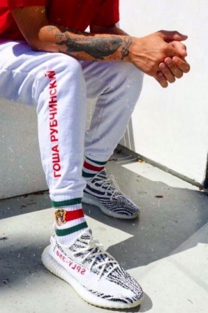 Louis Tomlinson in Gosha Rubchinskiy pants