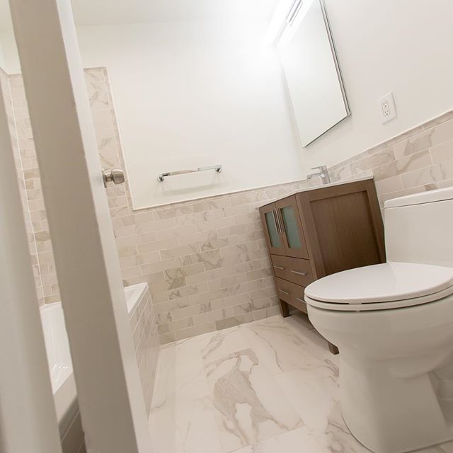 Simple, measured elegance in off-white.... #bathroom #bathroomdesign #renovation #homeinterior #kohler #westvillage #westvillagelife #tiles