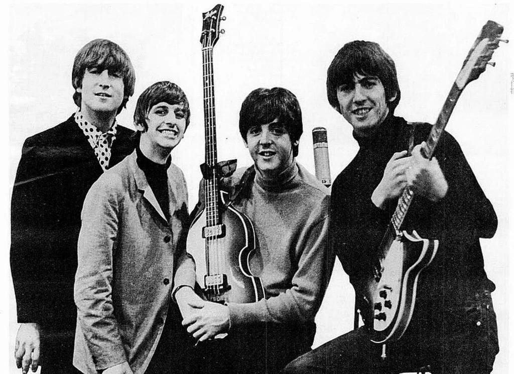 1024px-Beatles_ad_1965_just_the_beatles_crop.jpg