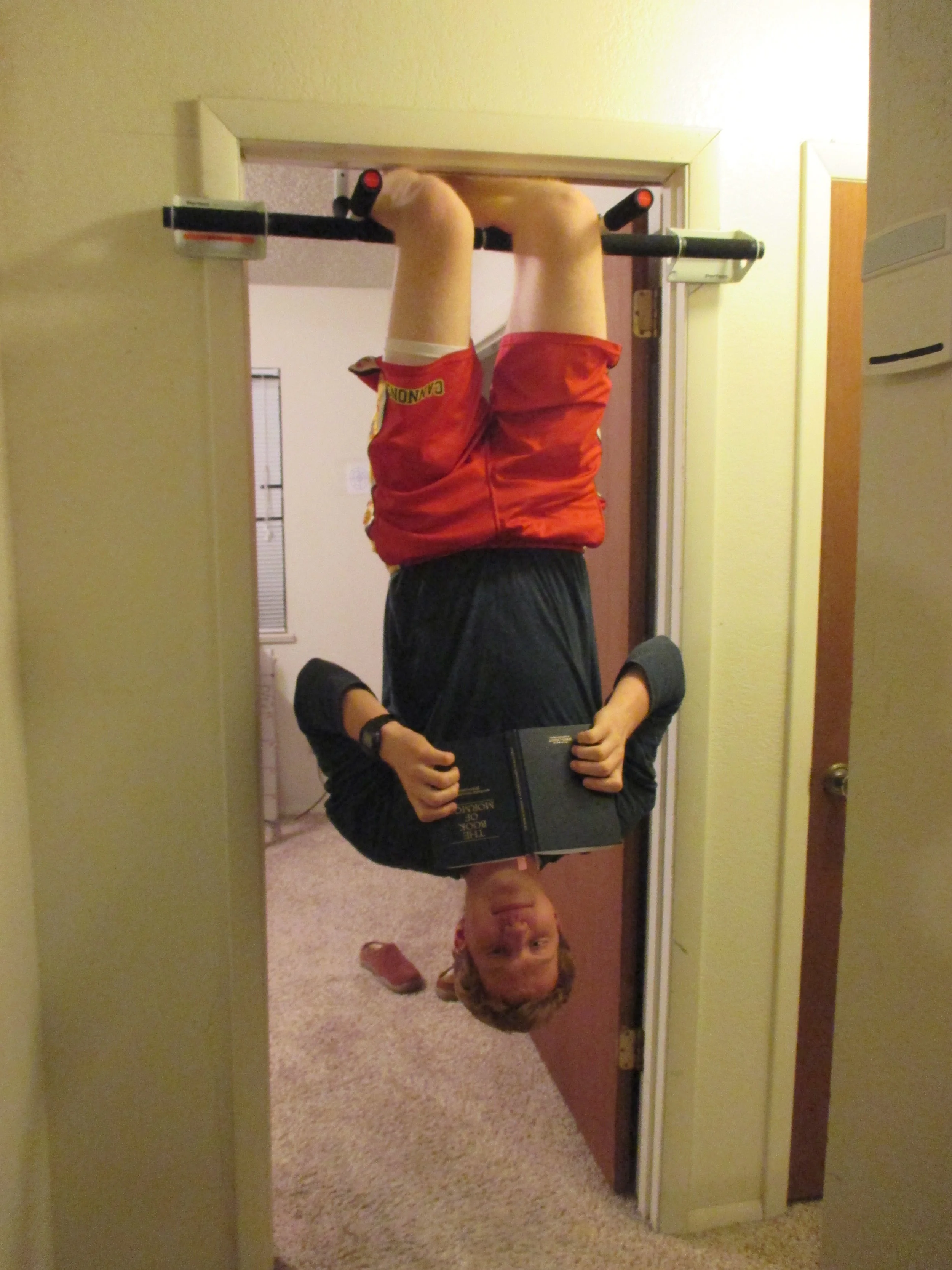 Grand Mesa Reading Scriptures Hanging Upside Down 9-16.JPG