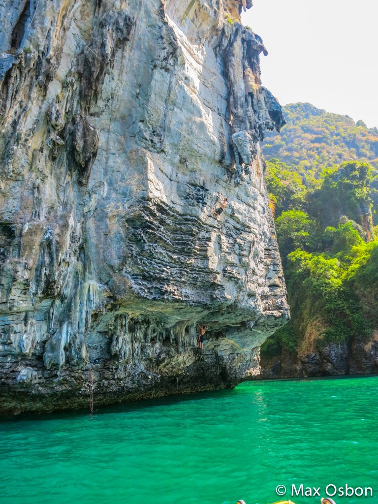 The color of the water varies throughout the coastline but is primarily very green.