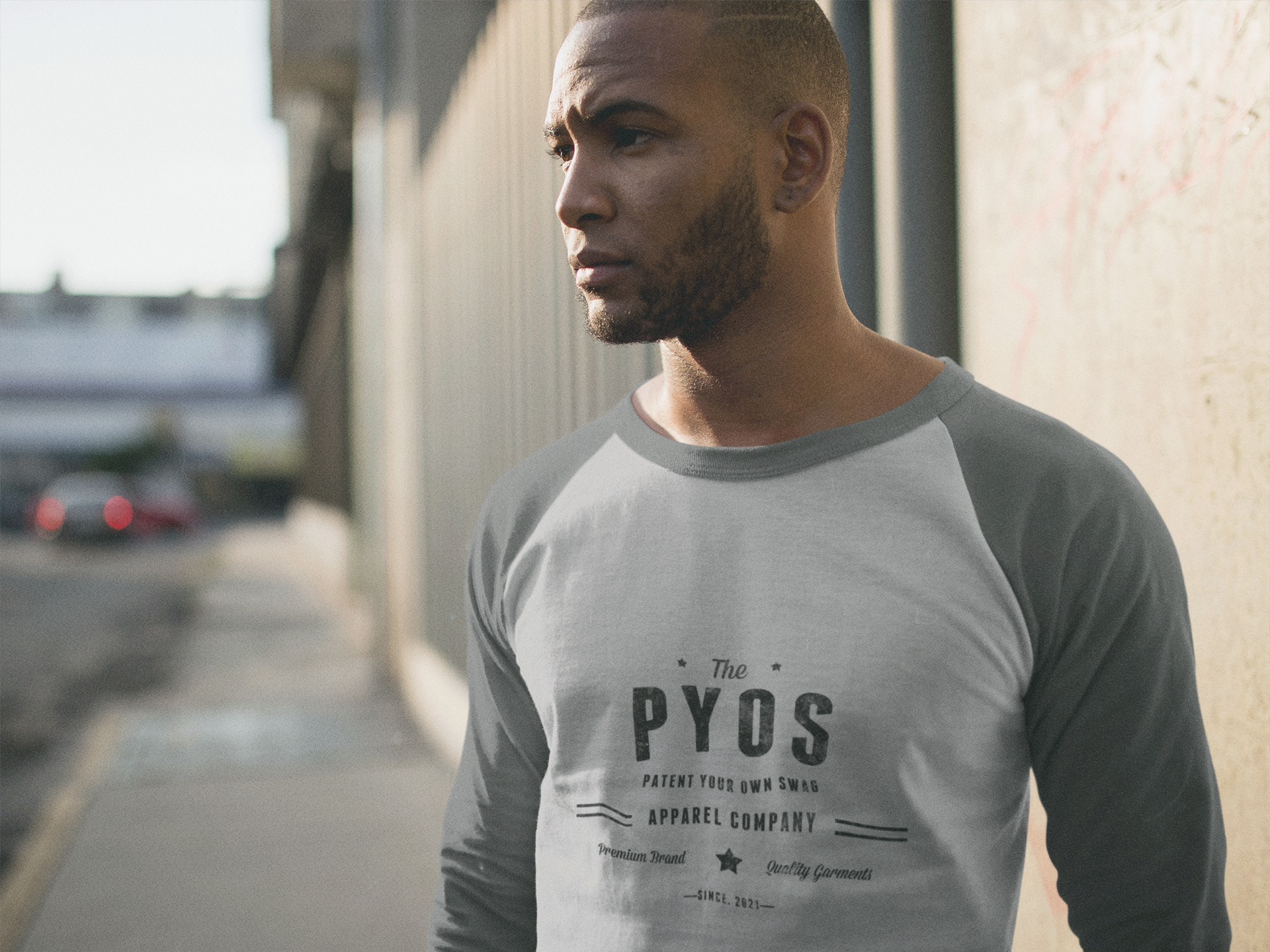 raglan-tee-mockup-of-a-serious-young-man-in-the-street-a12557a.png