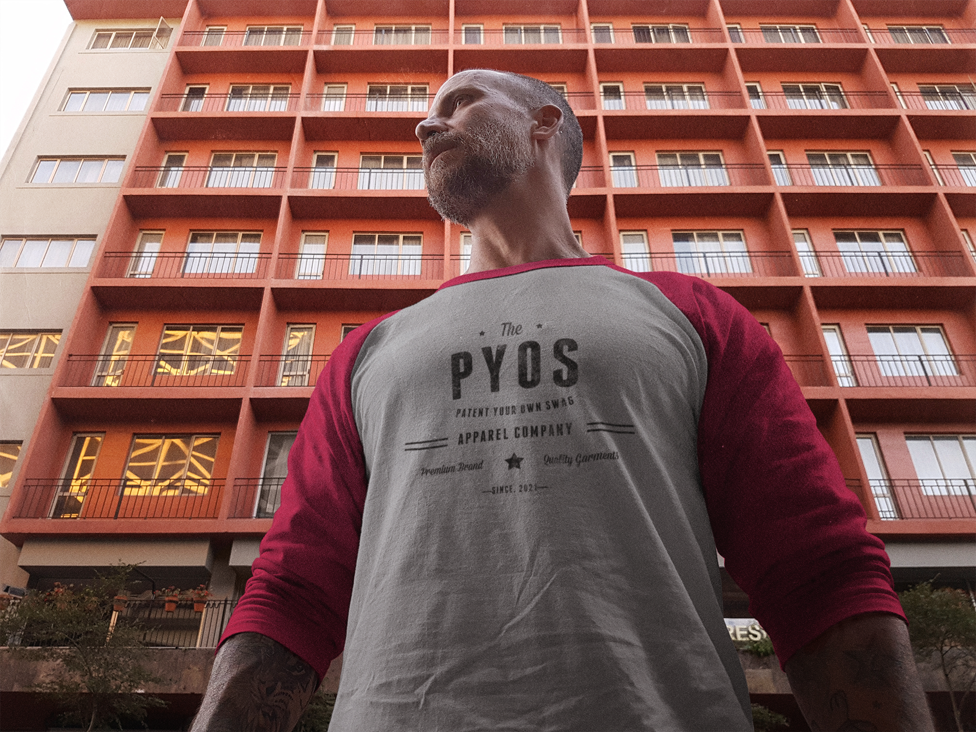 raglan-t-shirt-mockup-featuring-a-middle-aged-man-out-in-the-street-a12618.png