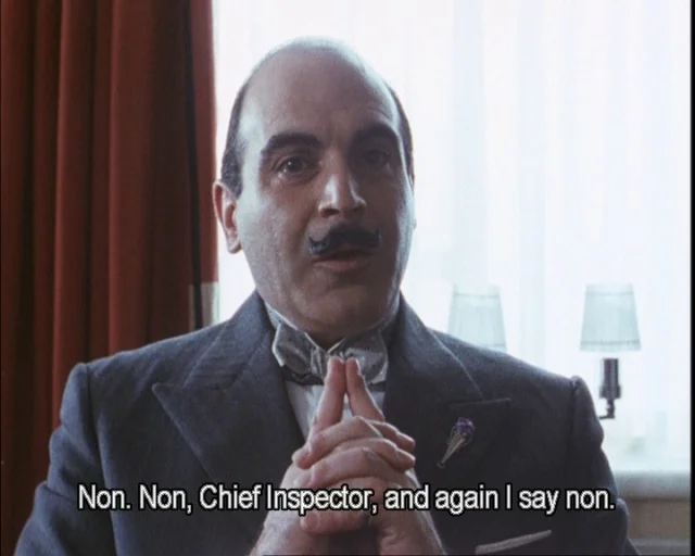 Poirot says "Non."