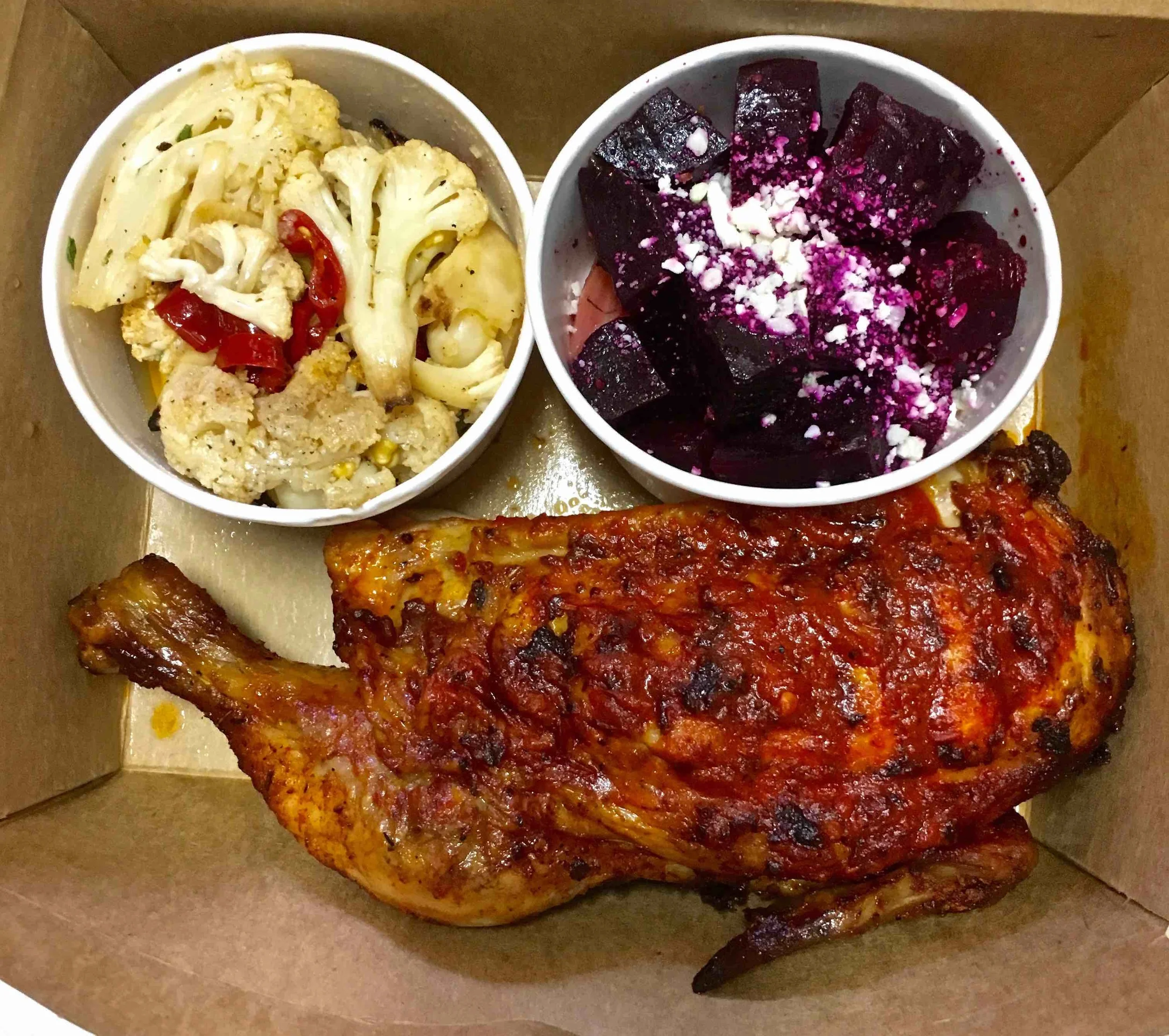 peri peri half chicken with roasted cauliflower and beets with goat cheese