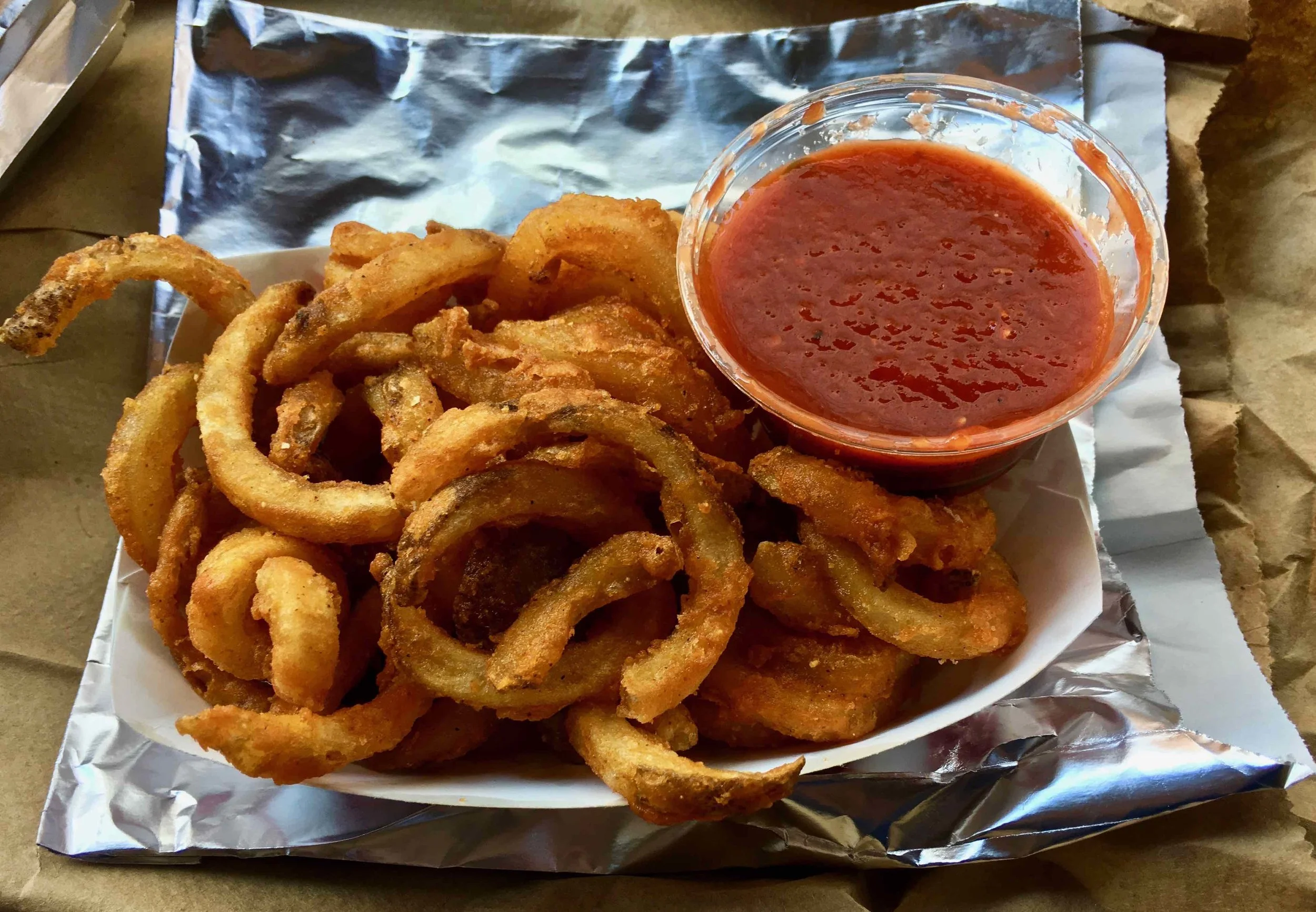 curly fries with side of sriracha