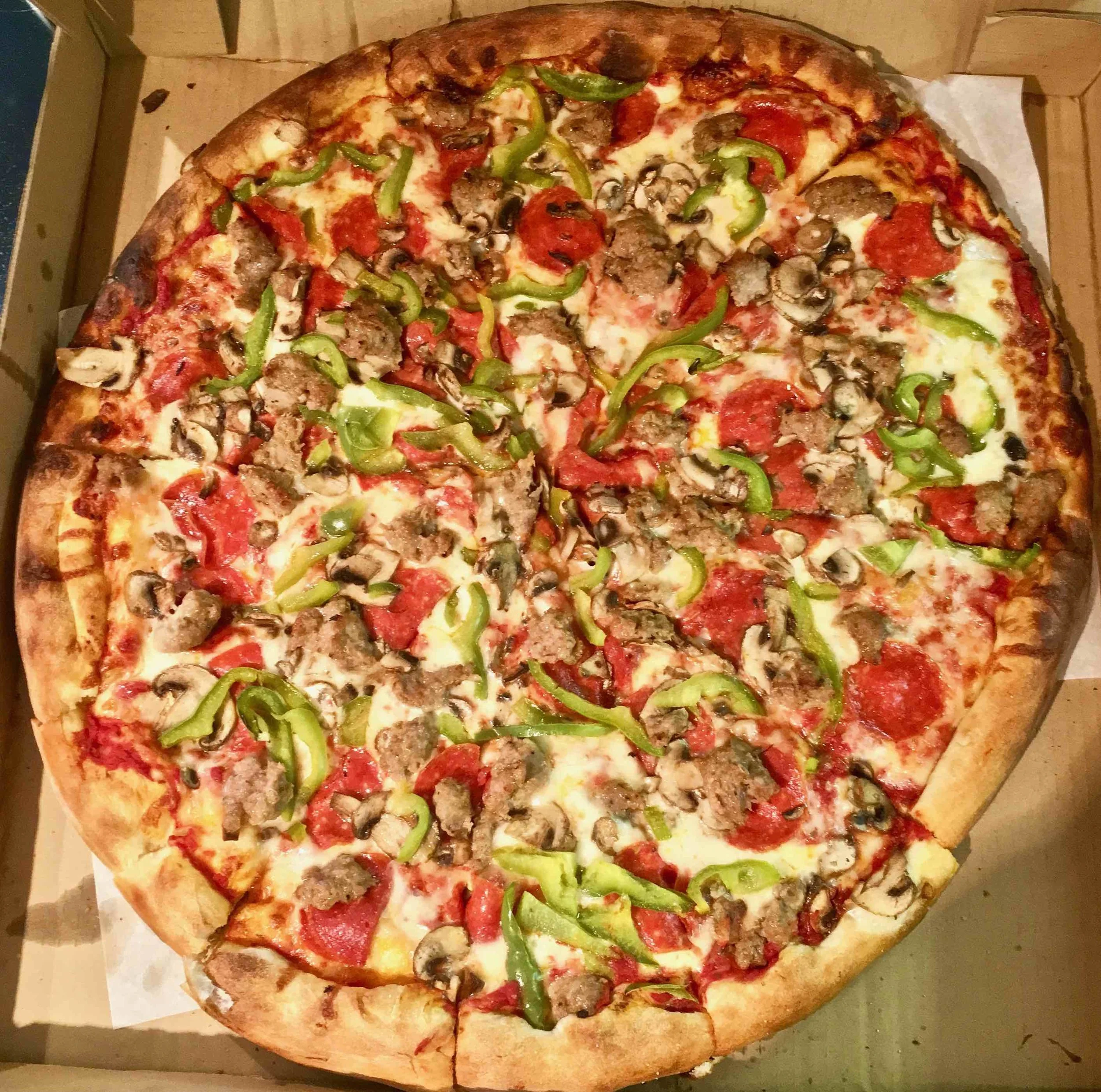 sausage pepperoni mushroom and green pepper pizza