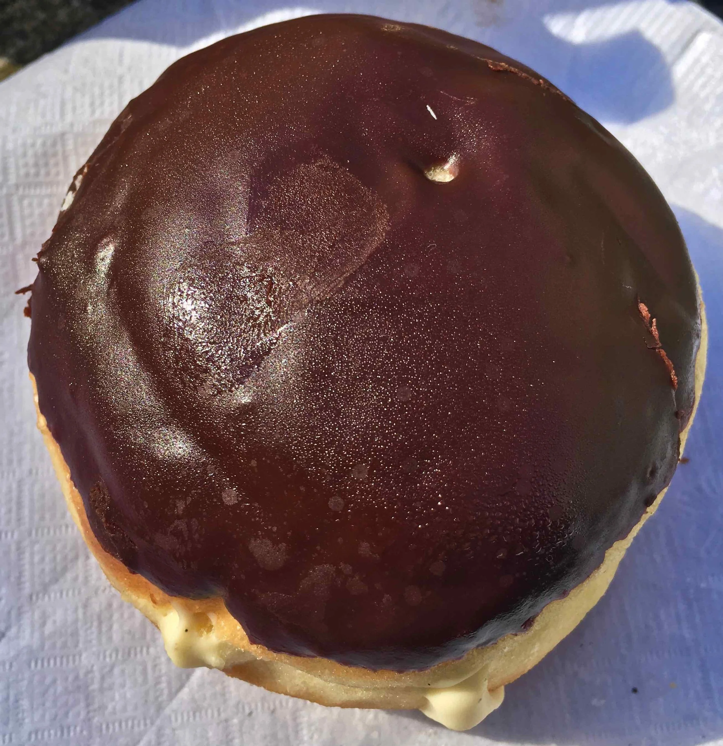 chocolate iced vanilla cream filled doughnut