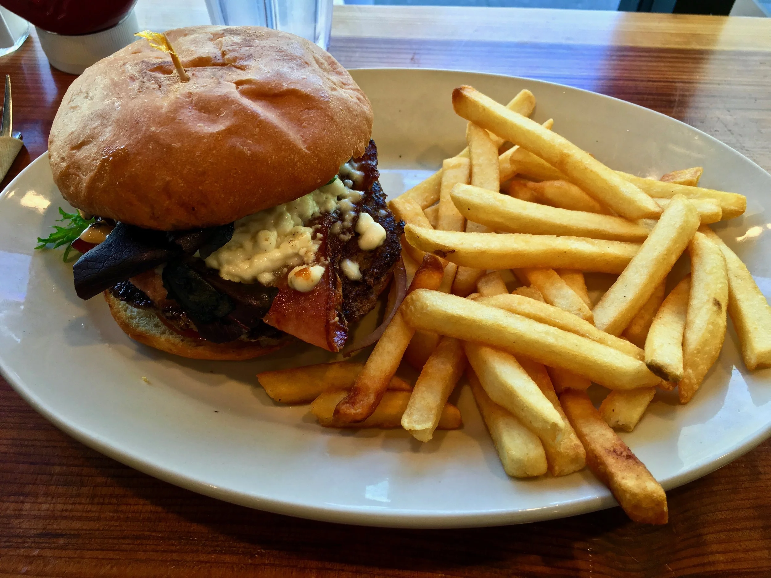 feta cheese bacon burger and fries