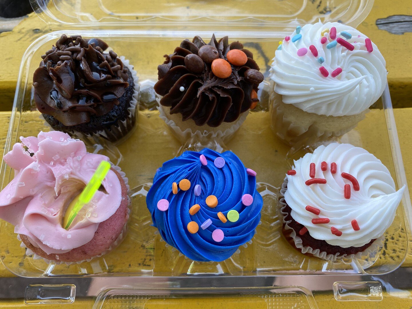 collection of mini #cupcakes from #crazyaboutcupcakes they were supposed to be different flavors but all kind of tasted the same. Just different colors of #buttercream and #vanillacake #dessert #sweets #mitchellsd #food #placesiveeaten oh well