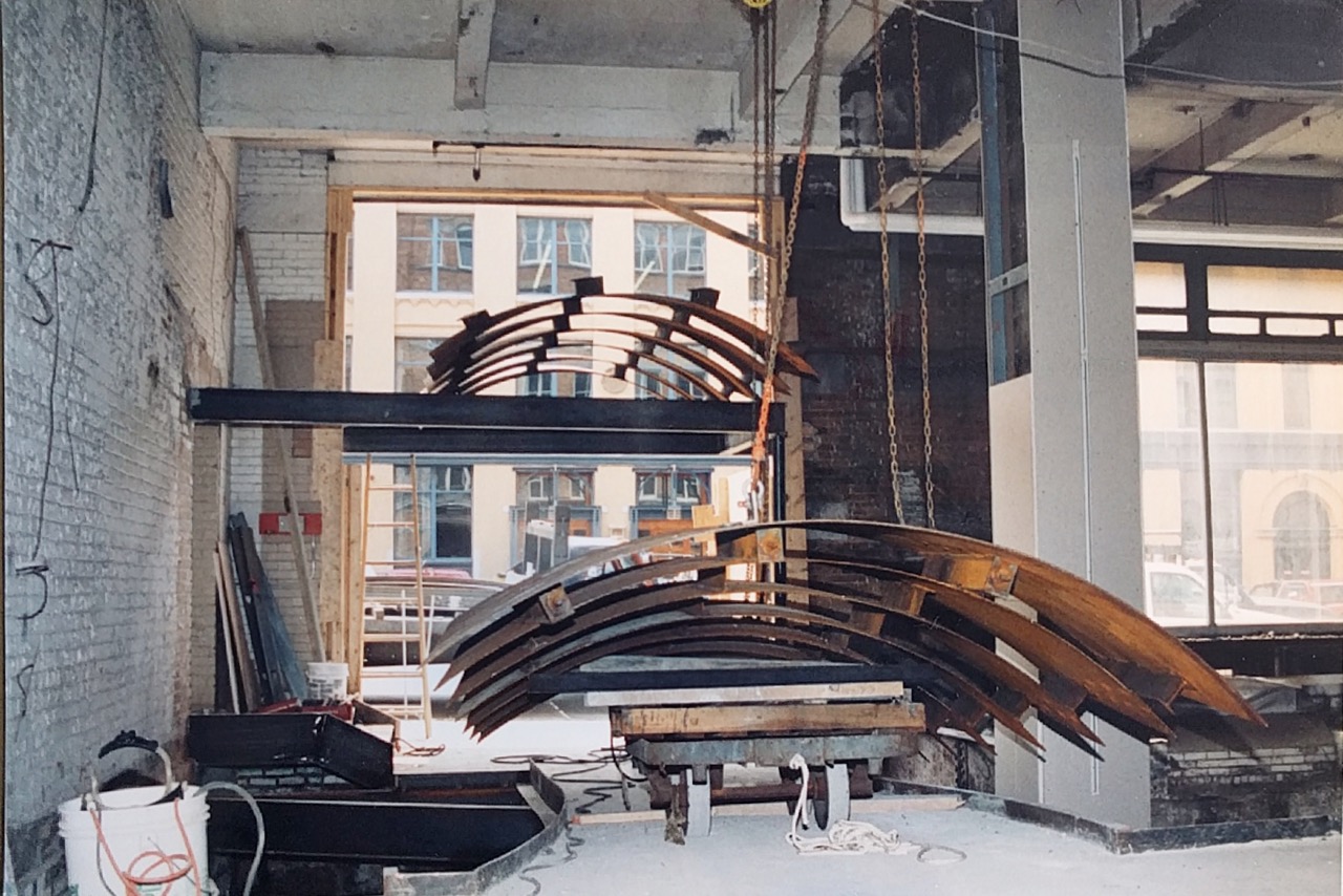 Awning construction from recycled steel found in building, circa. 1994