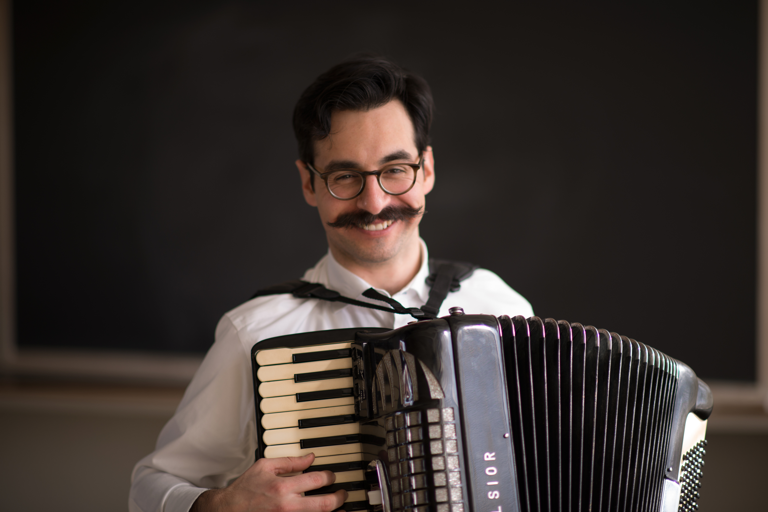 Accordionist & pianist George Lykogiannis has performed extensively throughout the United States and in Europe. He appears regularly along the east coast of the US playing the accordion in various ensembles, spanning a wide variety of genres that include classical, jazz, punk, folk, and world music. As a classically trained pianist, he has performed as a soloist with orchestras in Indiana, New Jersey, and in Italy, and his solo piano concerts have brought him to numerous venues throughout the New York metropolitan area and abroad. Mr. Lykogiannis also teaches piano lessons and accompanies ballet classes. He is currently pursuing his Doctorate of Musical Arts (DMA) in classical piano performance at Rutgers University.