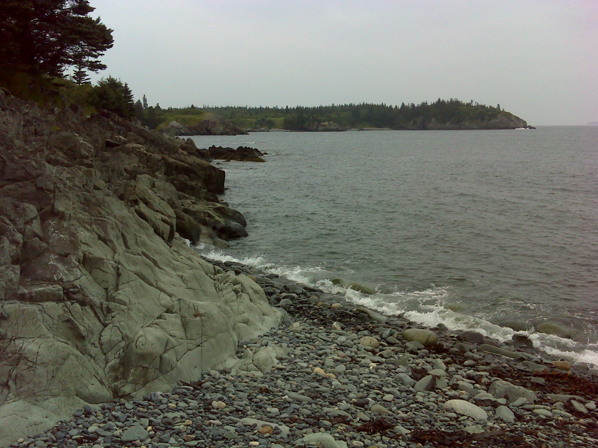 The beach at the end of the Meadow Trail, looking east across Hamilton Cove