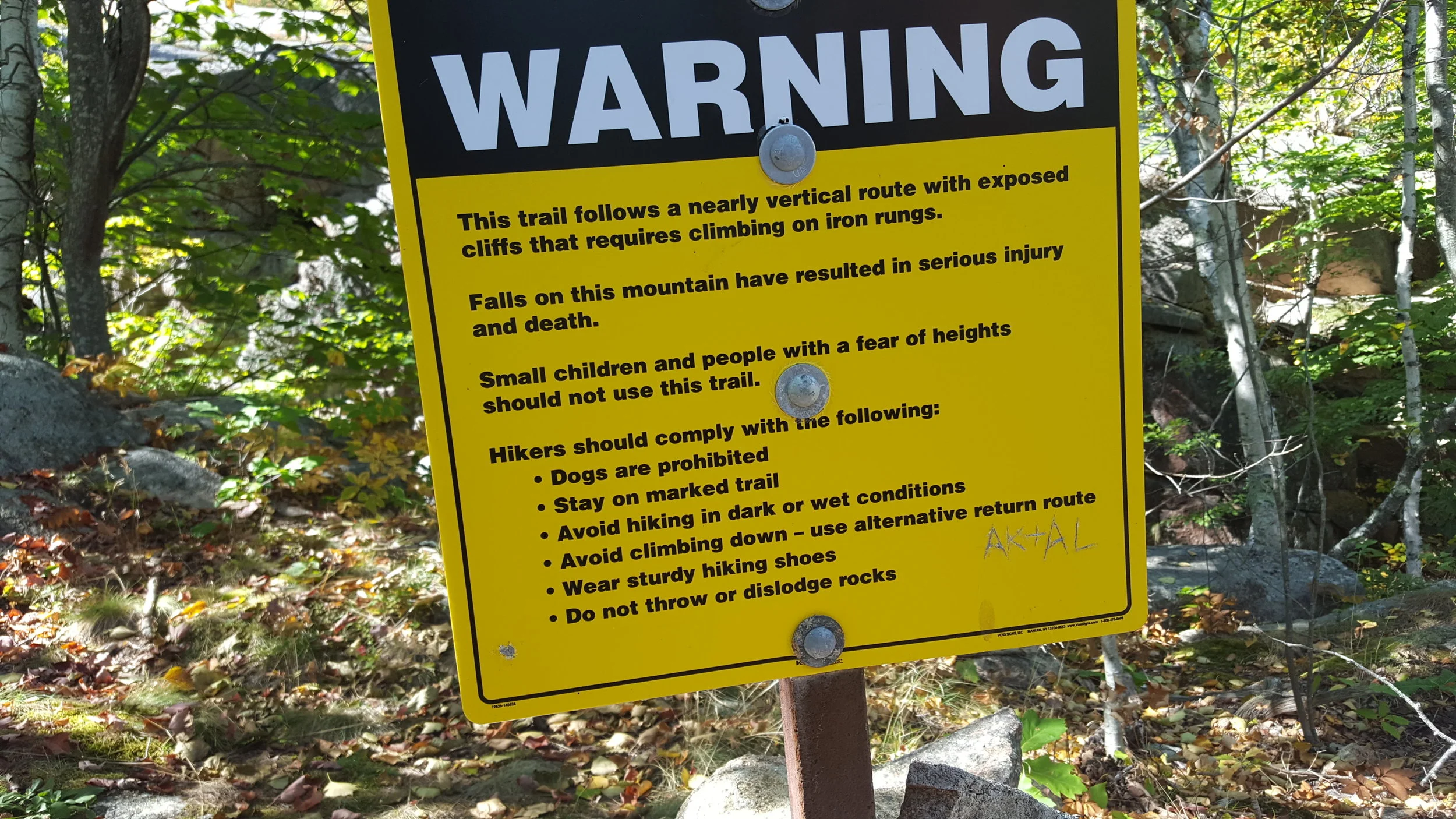This sign near the trailhead applies to both The Precipice and Orange & Black Trails