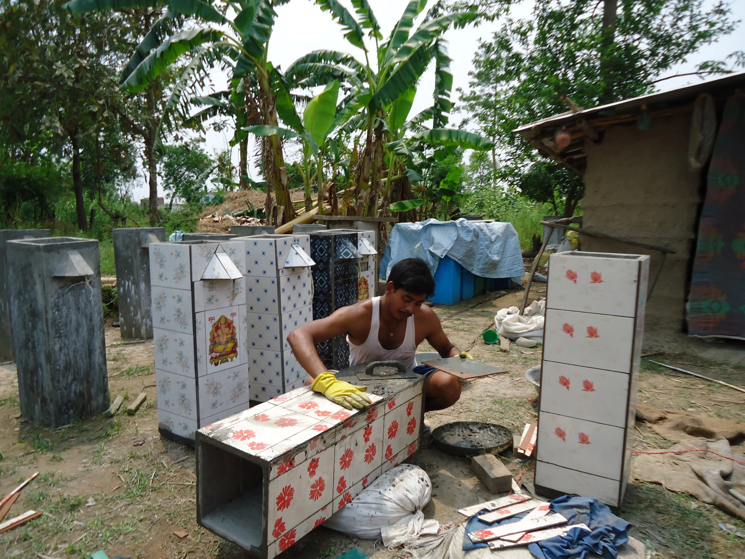 BSF entrepreneur, named Manoj, finishing BSF in Kailali. (Source: ENPHO) .