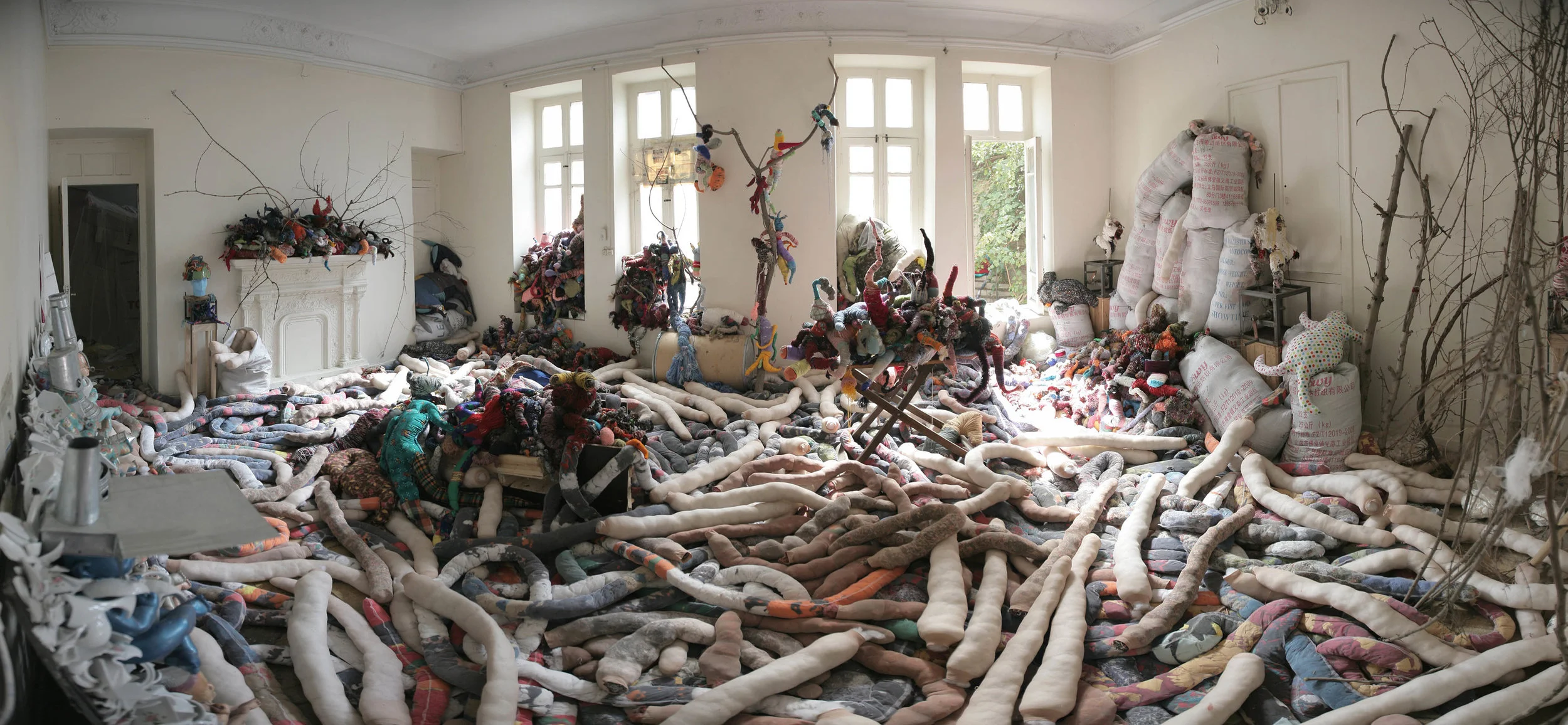 Dream catcher, 2015, Installation view in a timeworn house before getting gentrified in Tehran (Interior view), Fabric, wool, ceramic, branches, wood, plaster, found objects, Dimensions: variable