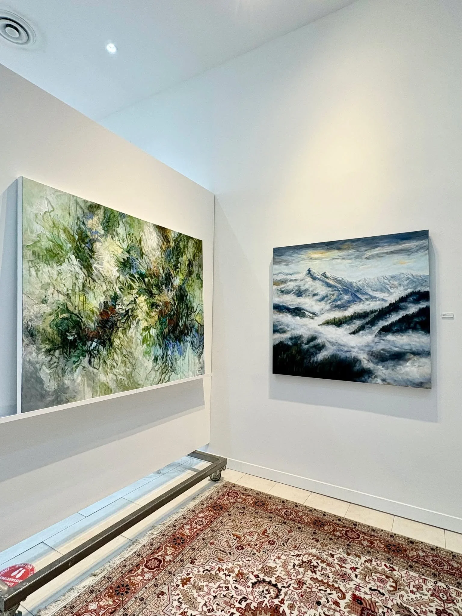 Popped into @iantangalleryvancouver yesterday and was excited to spot my painting "Mountain Sojourn" hanging on the wall, alongside a stunning @jeanettejarville.art painting. 👀😍.

There's something about being above the clouds, that rare 
