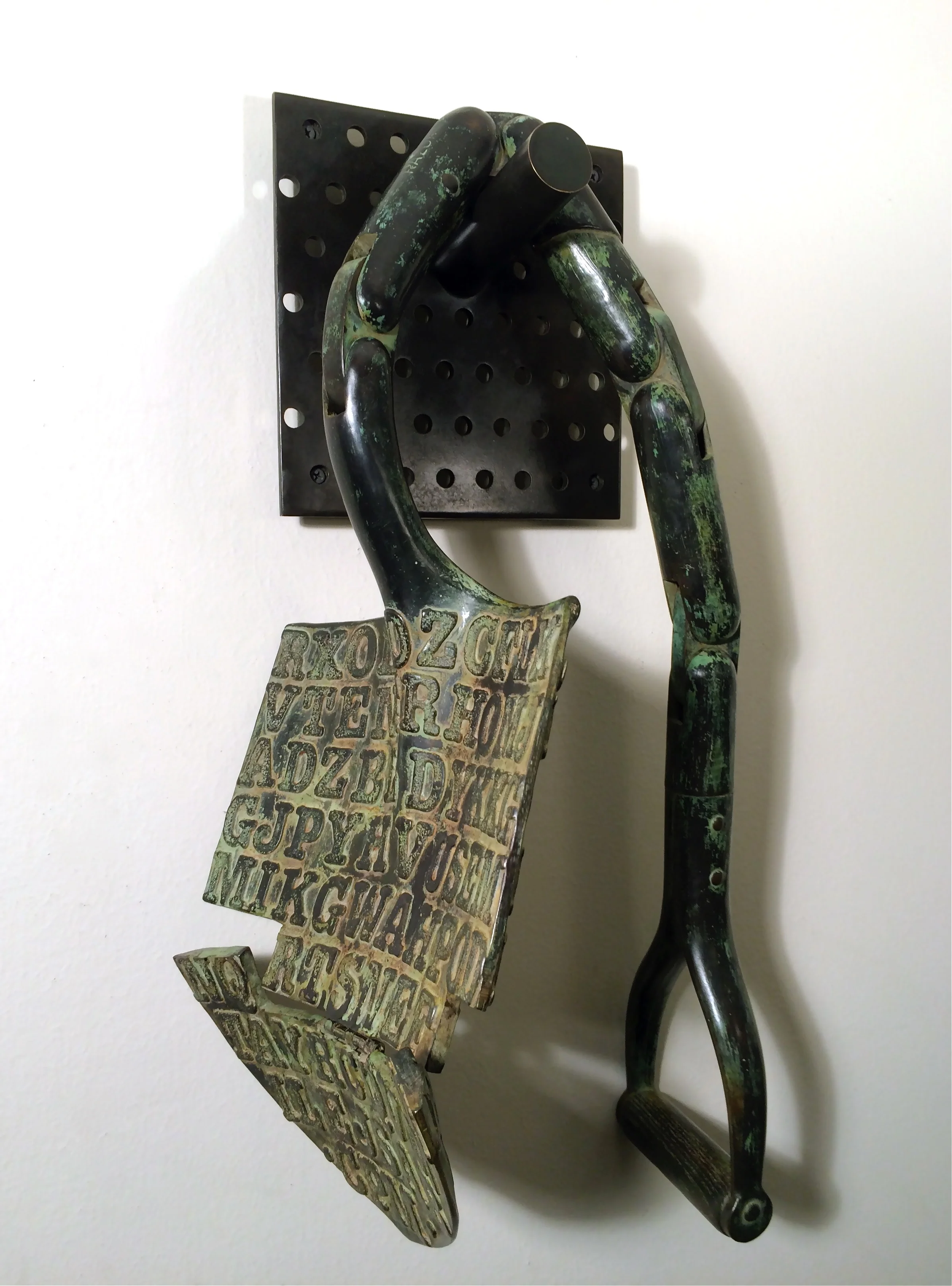 This sculpture went through 3 burials to achieve the patina- once in the mud under the lake, twice in the ground under the soil and wet leaves.