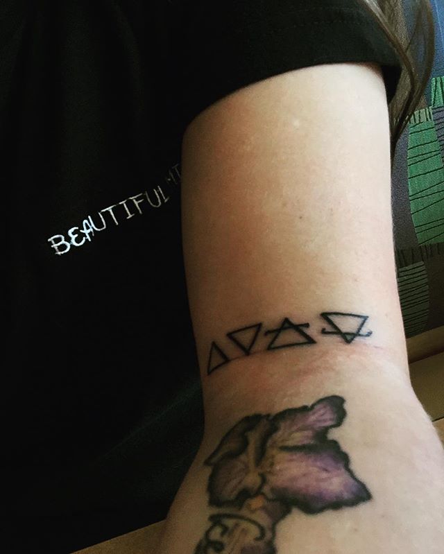 alchemy symbols: fire to me is passion, staying creative and keeping that fire lit under my ass always. water is clarity, beauty, transparency and my love for it is real. air is for adventure, getting out there and remembering to just breath when lif