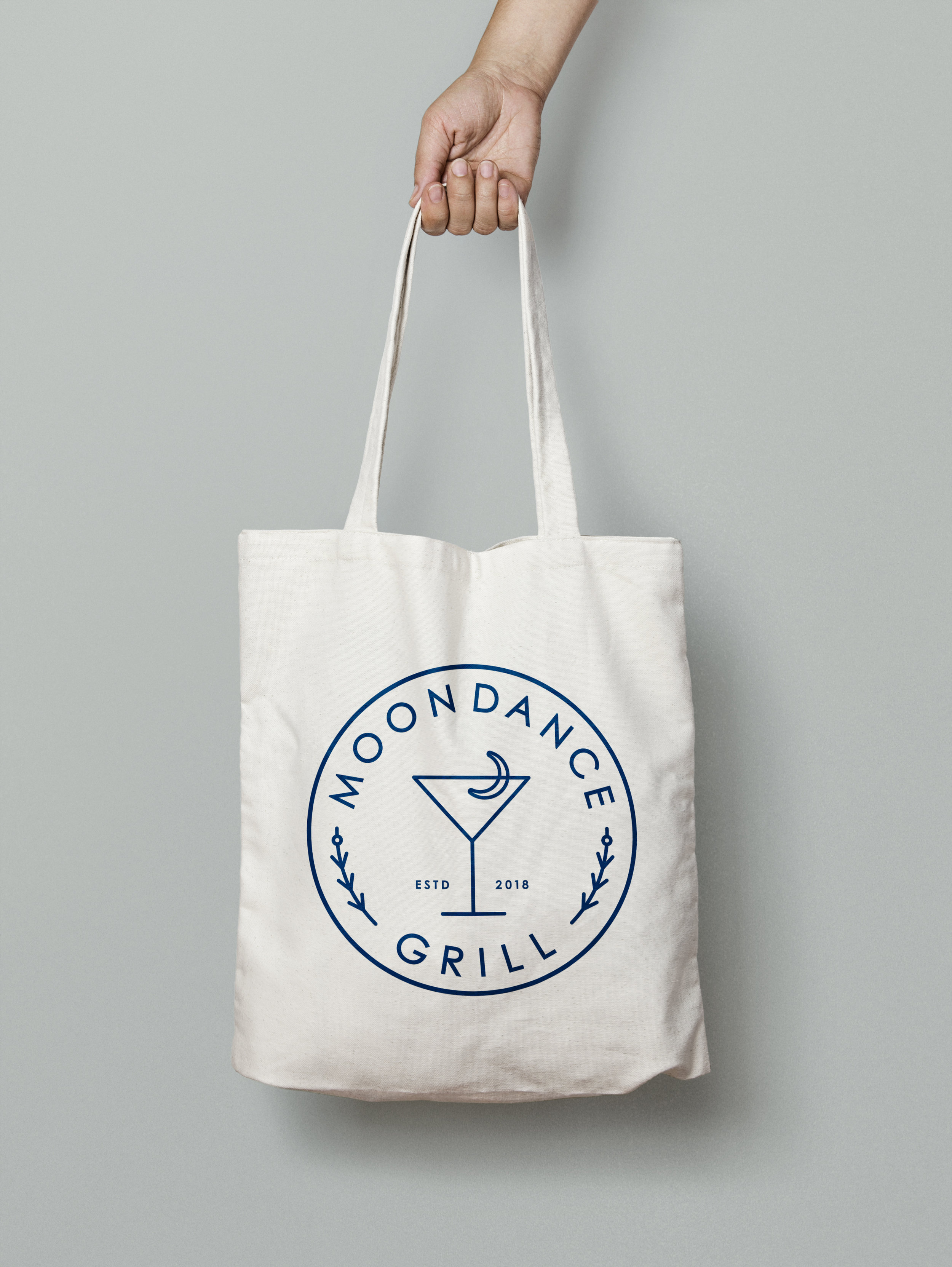  Moondance Grill Germantown Thornwood Prototype Logo Tote  for Tommy Peters, Beale Street Blues Company Memphis  Name development, branding creative and design by Chuck Mitchell 