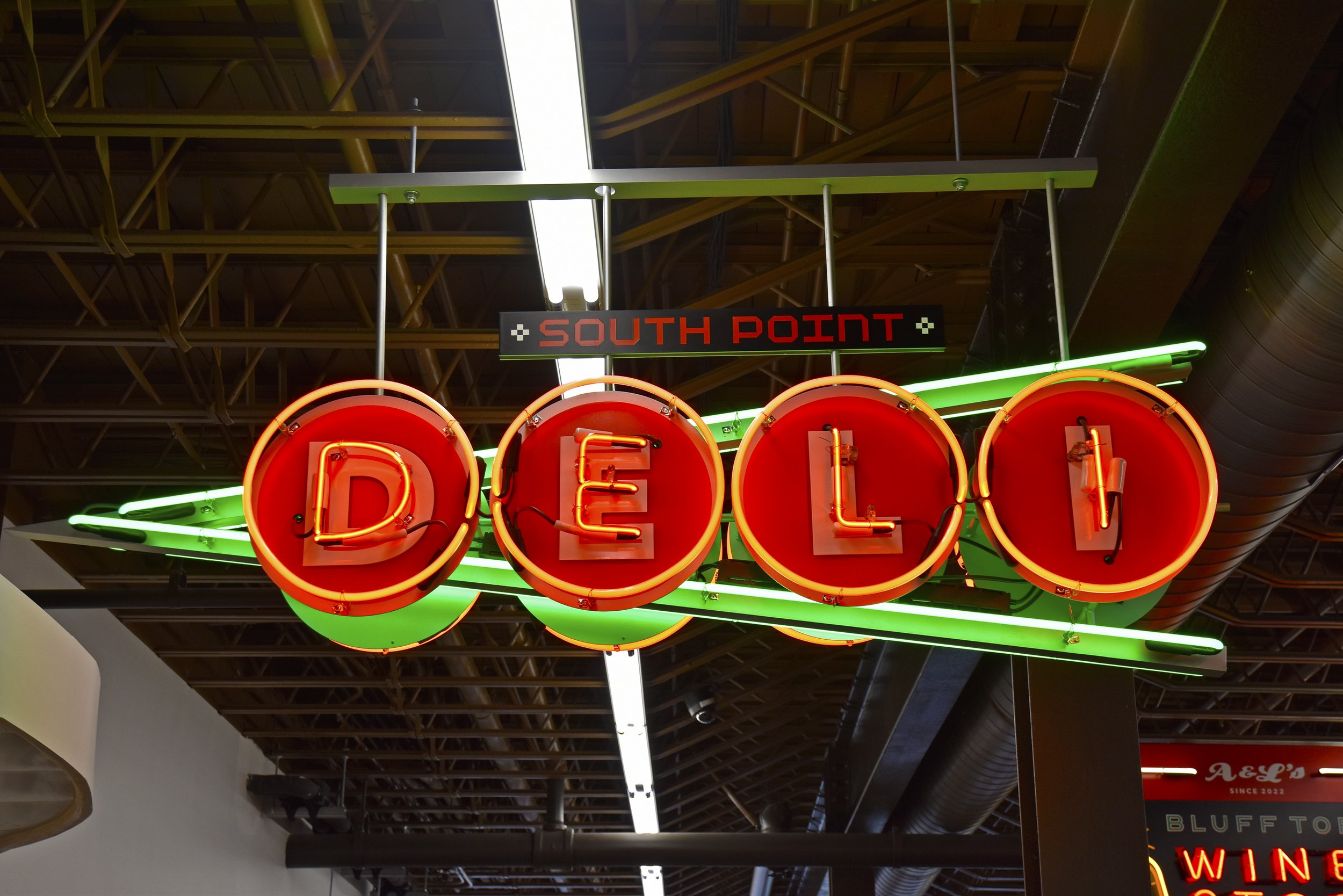  South Point Grocery  Downtown Memphis  “South Point Deli” department sign  Branding creative and design by Chuck Mitchell  Sign fabrication and installation by Frank Balton Sign Company 