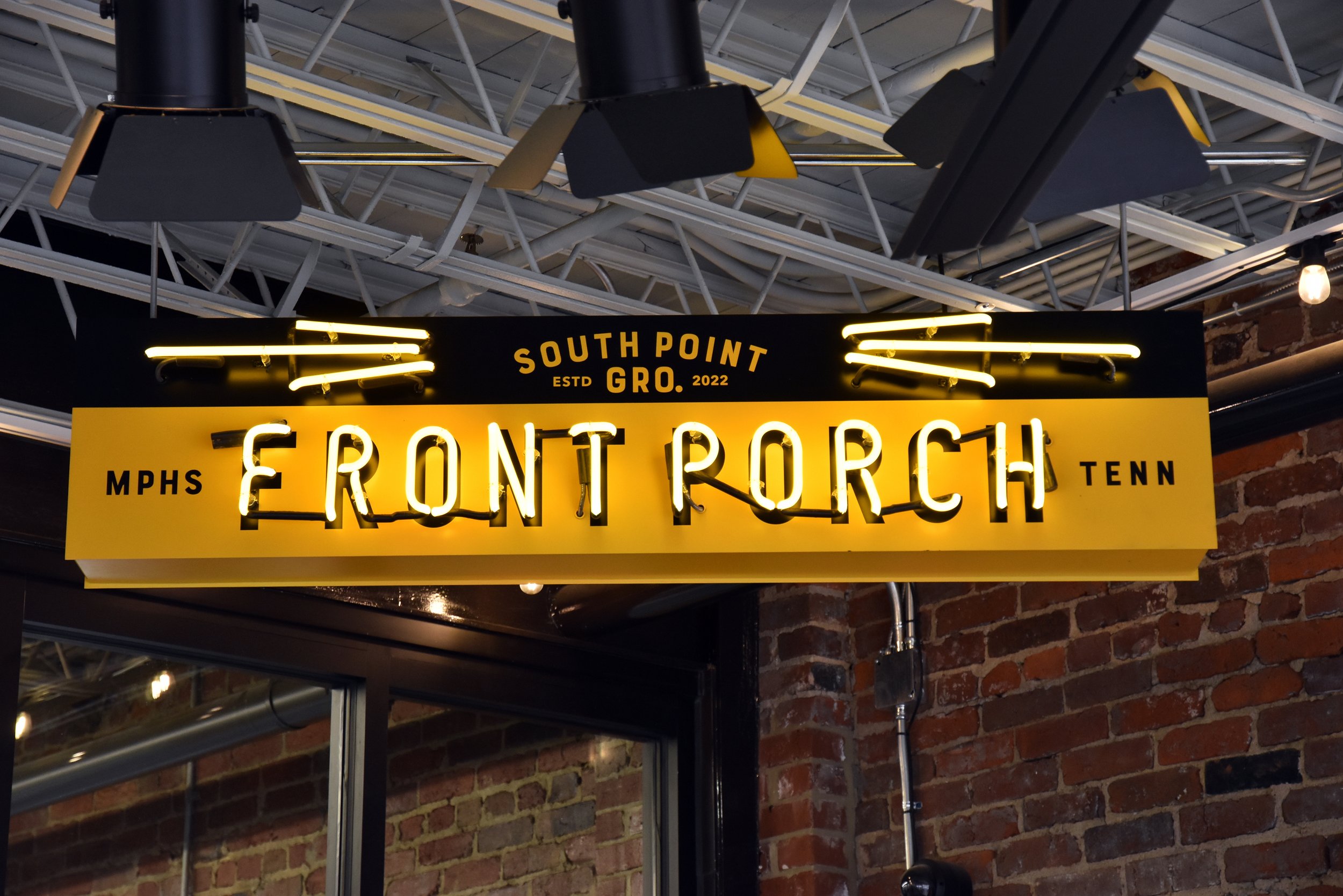  South Point Grocery  Downtown Memphis  “Front Porch” neon sign  Branding creative and design by Chuck Mitchell  Sign fabrication and installation by Frank Balton Sign Company 