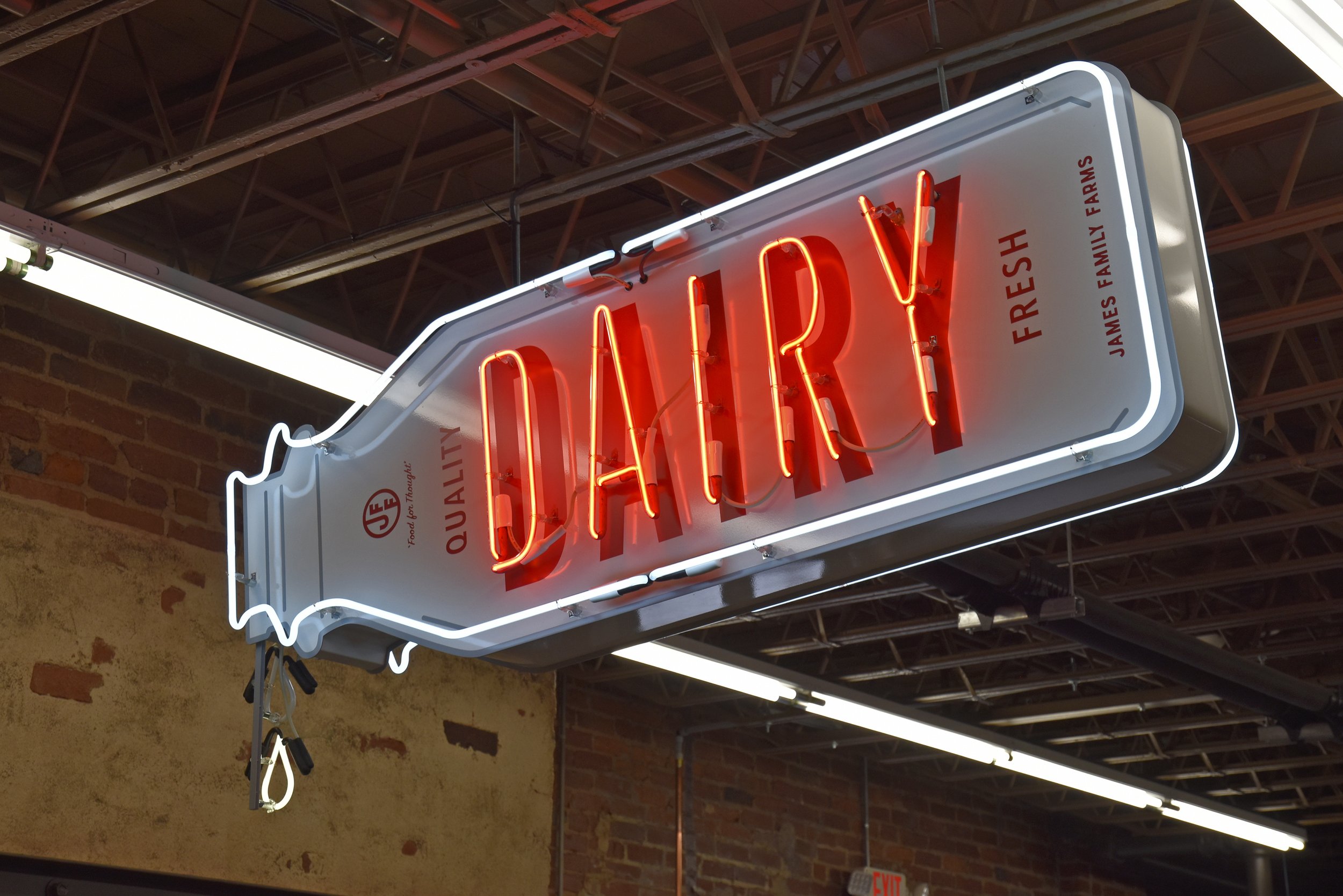  South Point Grocery  Downtown Memphis  “Dripping Milk Bottle” dairy department neon sign with flashing action drops  Branding creative and design by Chuck Mitchell  Sign fabrication and installation by Frank Balton Sign Company 