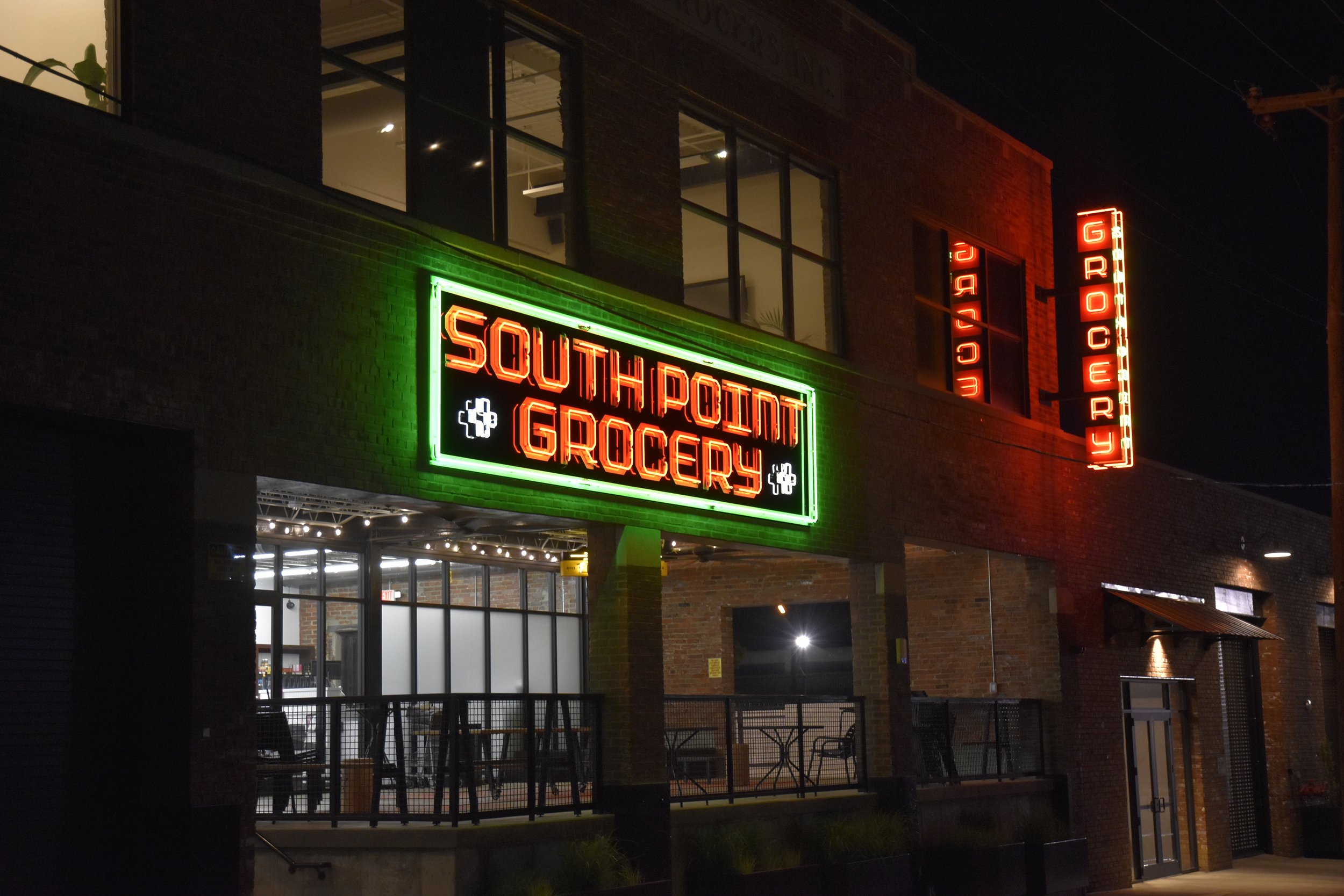  South Point Grocery Project  Downtown Memphis  Main entrance neon cabinet sign and neon blade sign  Branding creative and signage design by Chuck Mitchell  Sign fabrication and installation by Frank Balton Sign Company  Interior Design by Cynthia Ha