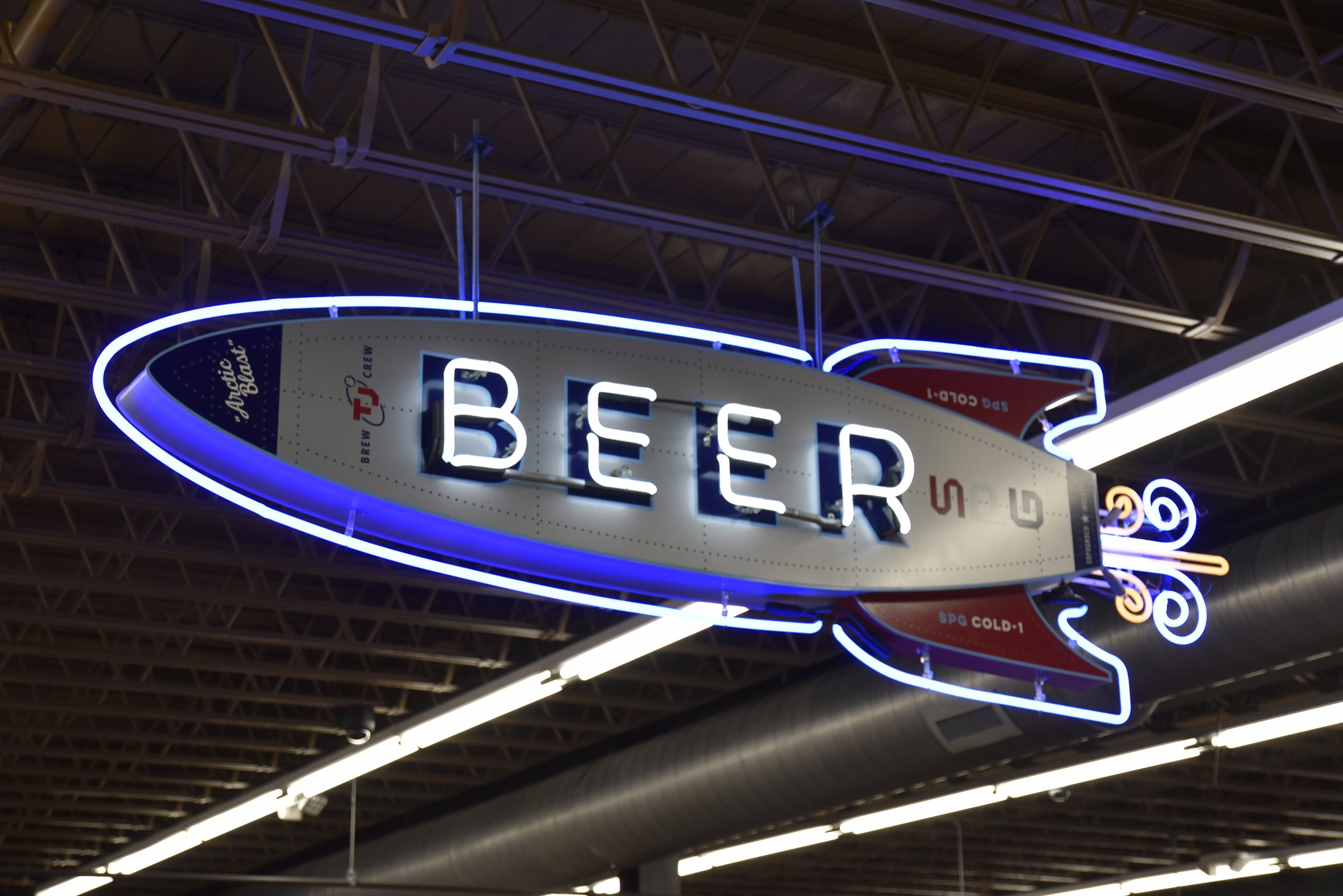  South Point Grocery  Downtown Memphis  “Rocket Ship” neon beer sign with flashing action vapor trail exhaust  Branding creative and design by Chuck Mitchell  Sign fabrication and installation by Frank Balton Sign Company 