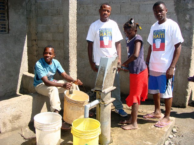  St. Peter Catholic Church “Get Well Haiti” mission project to help build and repair fresh water wells in Ouanaminthe, Haiti  Wearables shared with the local community  Photo courtesy Fr. Eduardo Logiste, O.P.  Branding creative and design by Chuck M
