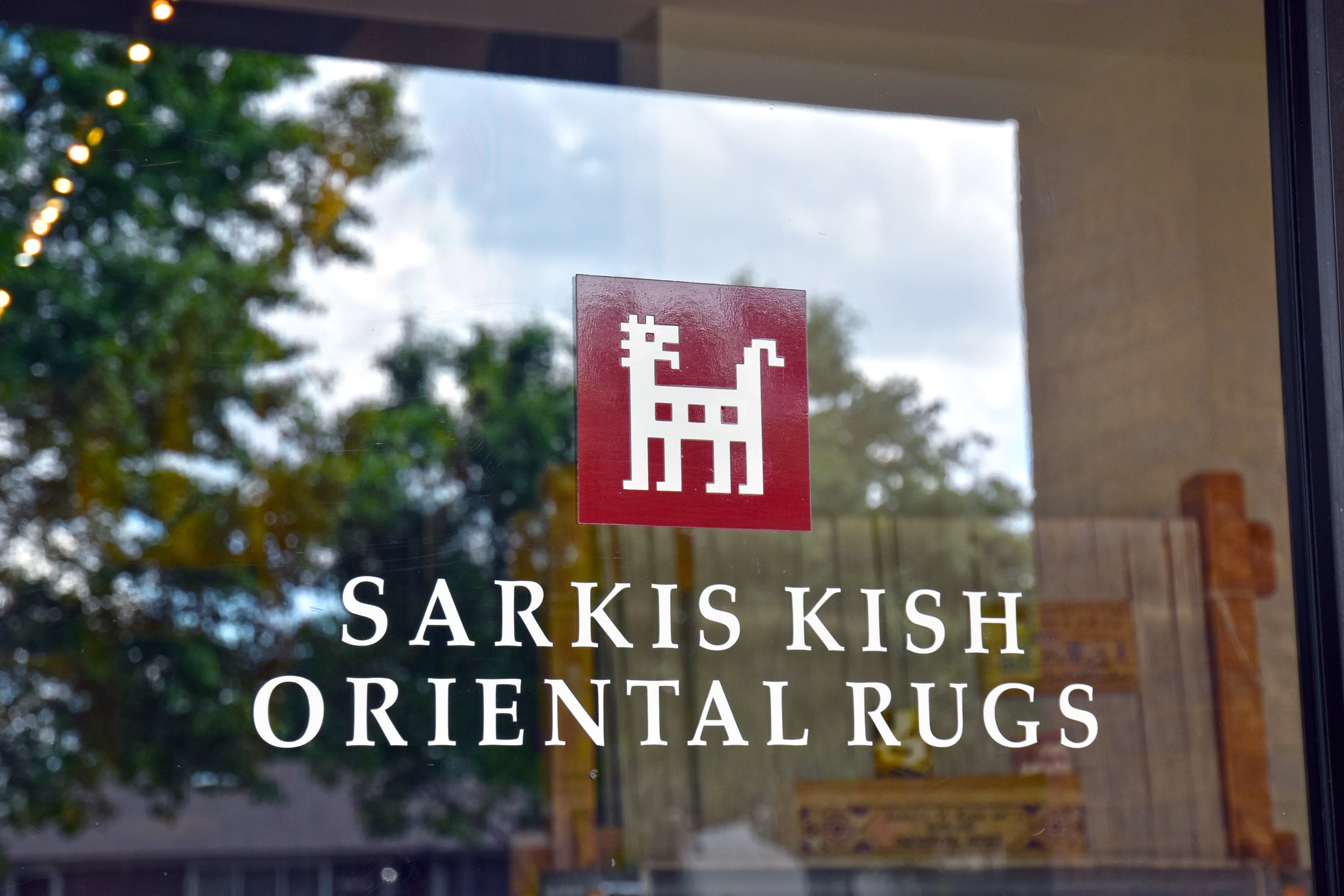  Sarkis Kish Oriental Rugs entrance signage  Branding creative and design by Chuck Mitchell 