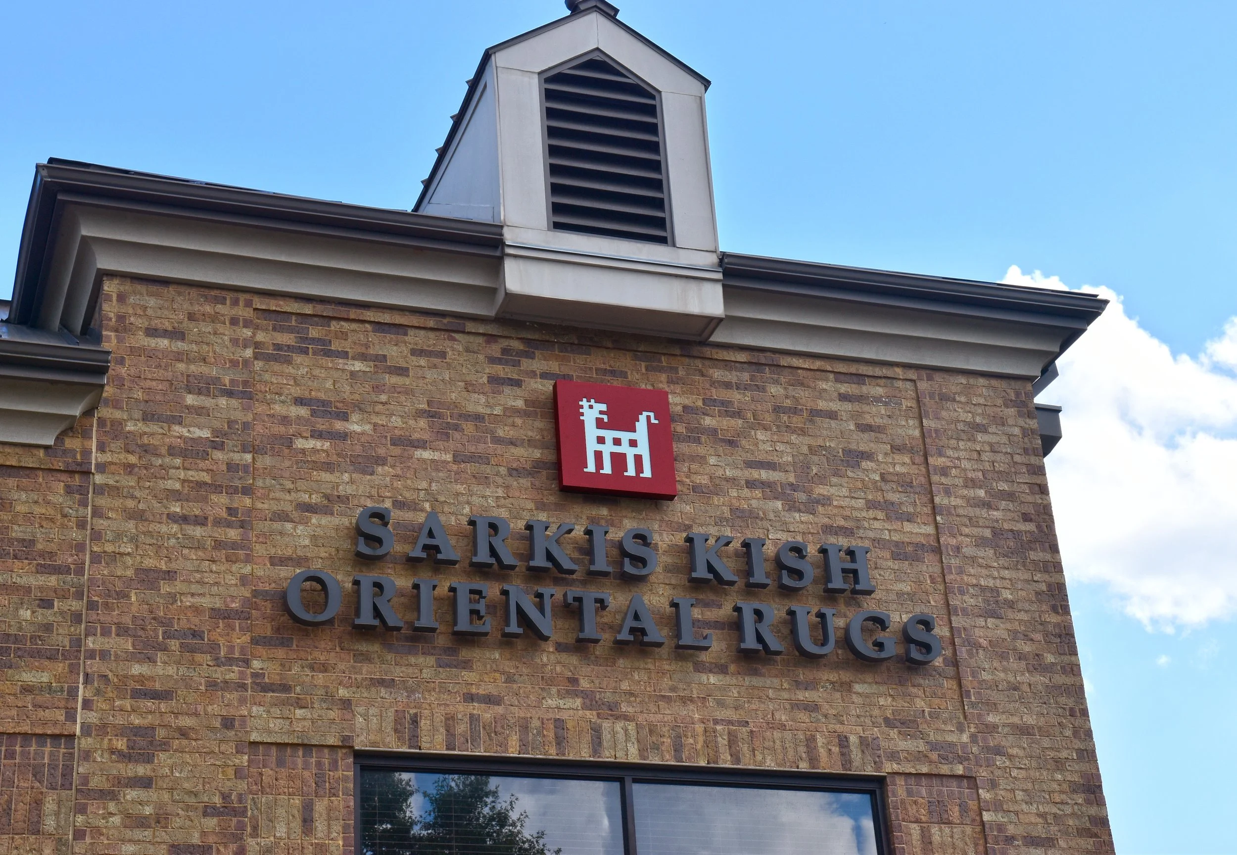  Sarkis Kish Oriental Rugs exterior signage  Branding creative and design by Chuck Mitchell 