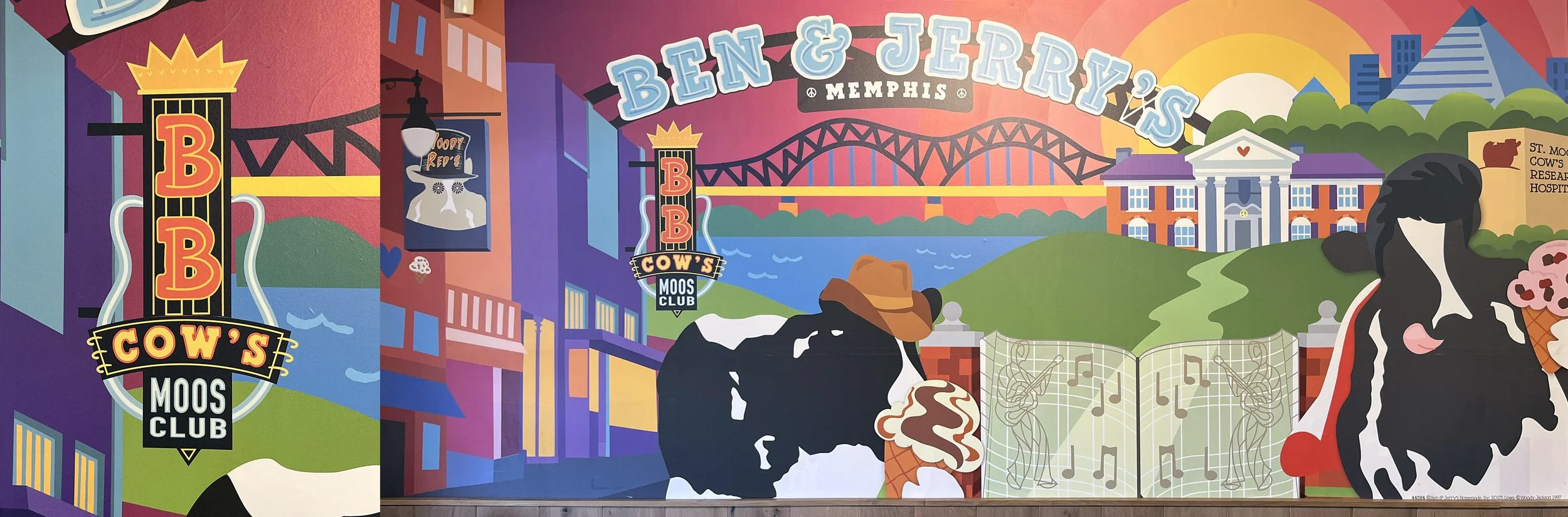  Mural as seen in Ben &amp; Jerry’s Memphis featuring artistic interpretation of Beale Street’s famous BB King’s sign (detail on left) and other Memphis related iconic images.  B&amp;J world famous “cow art” by original B&amp;J artist, Woody Jackson 