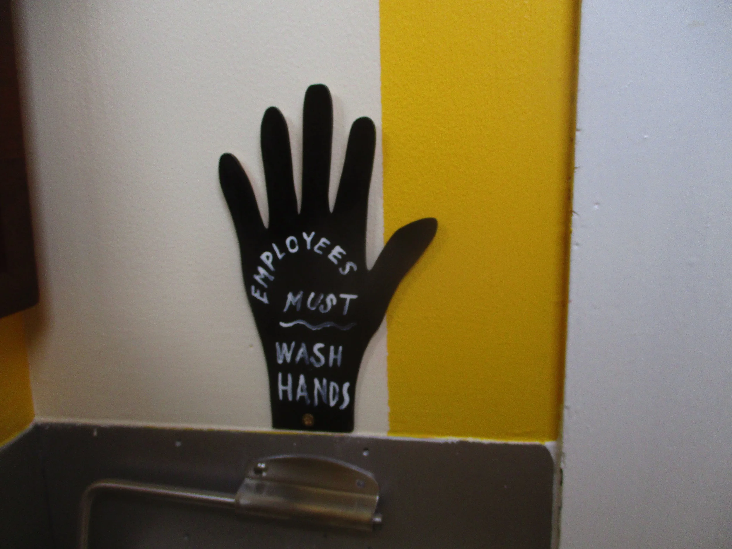 As usual, Etiquetteer believe these signs should read " Everyone must wash hands."