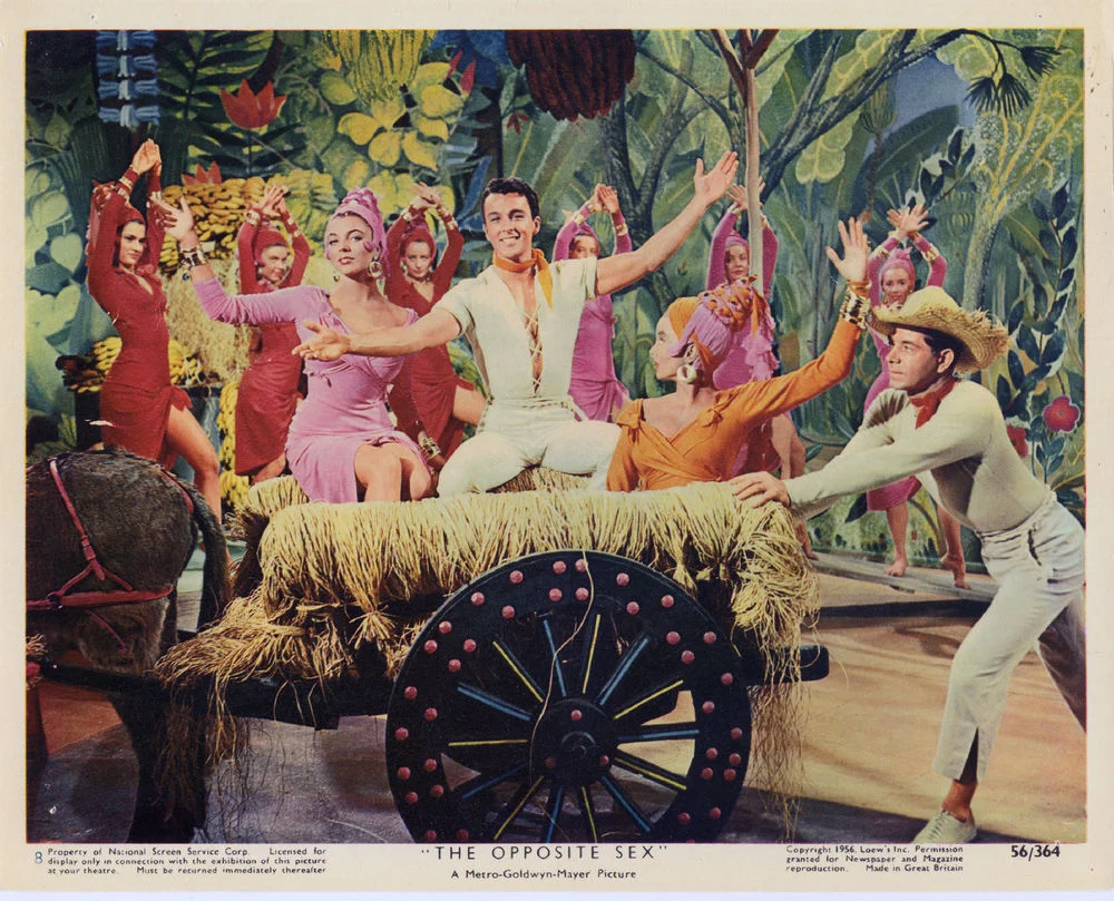 Joan Collins, Jerry Antes, and Carolyn Jones in the "Yellow Gold" number. Ain't he cute?