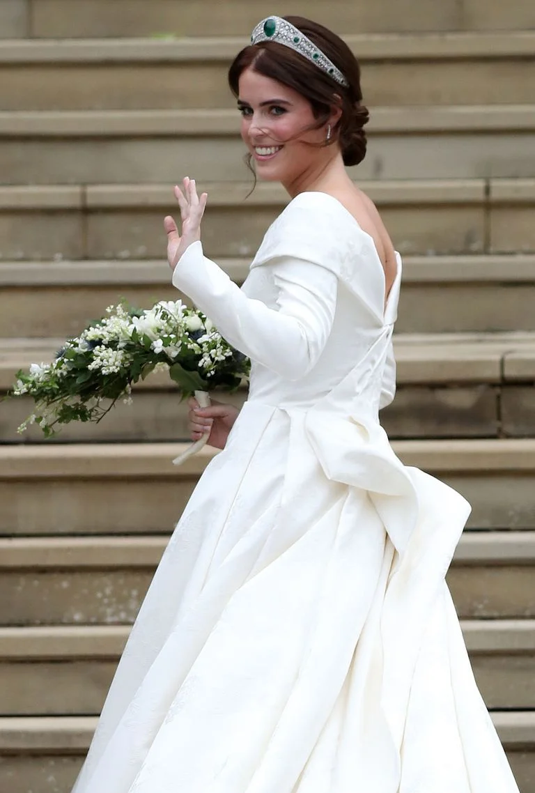 The Greville Emerald Kokoshnik Tiara receiving the adulation of the crowd while using Her Royal Highness Princess Eugenie as a pedestal.