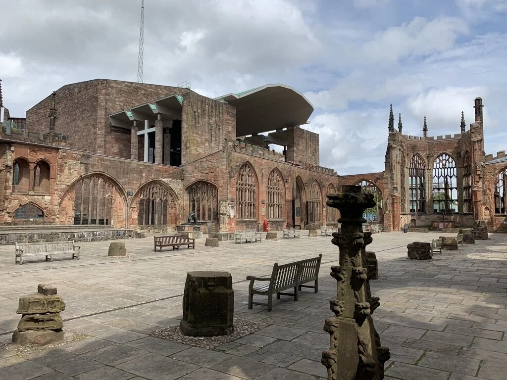 The bombed Coventry Cathedral, with the new cathedral to its side.