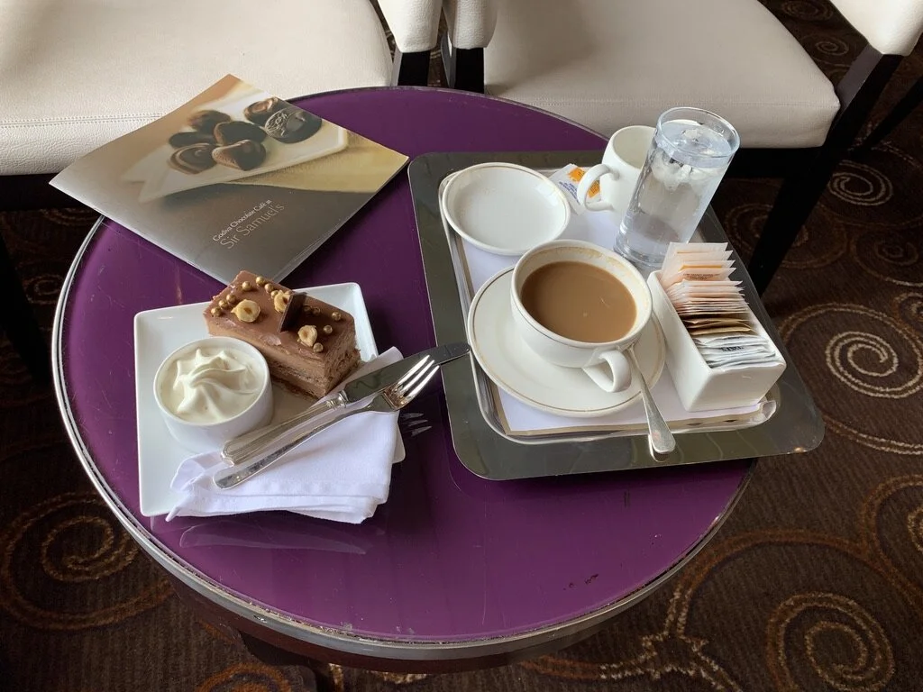A midafternoon indulgence in Sir Samuel’s, a concession run by Godiva. Is it any wonder Etiquetteer had difficulty squeezing into those trousers?!