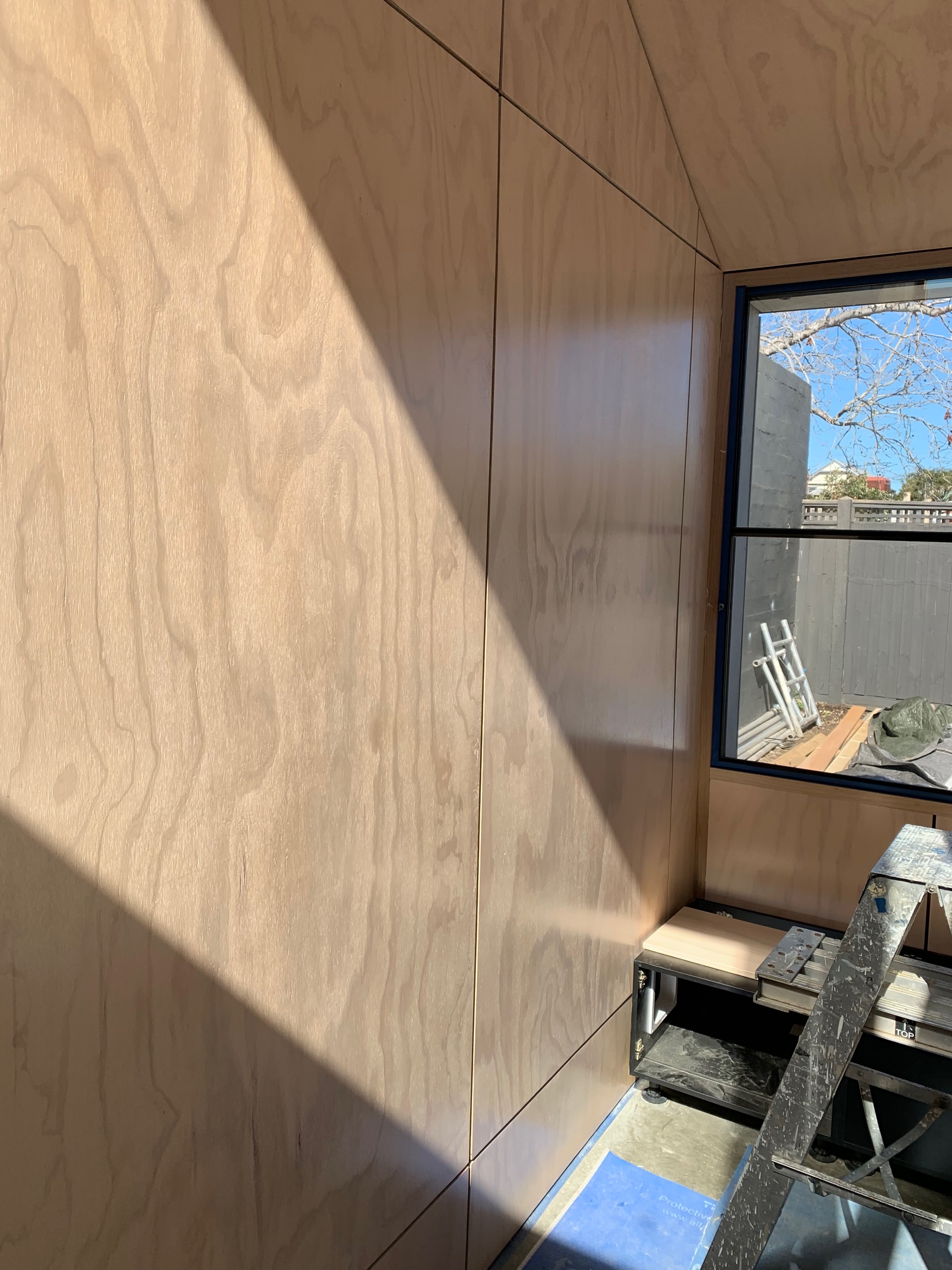 A three coat apPlication . Sealer coat clear, white wash and a final clear coat to seal it all up. InteRgrain ultra clear satin tiNted with white
