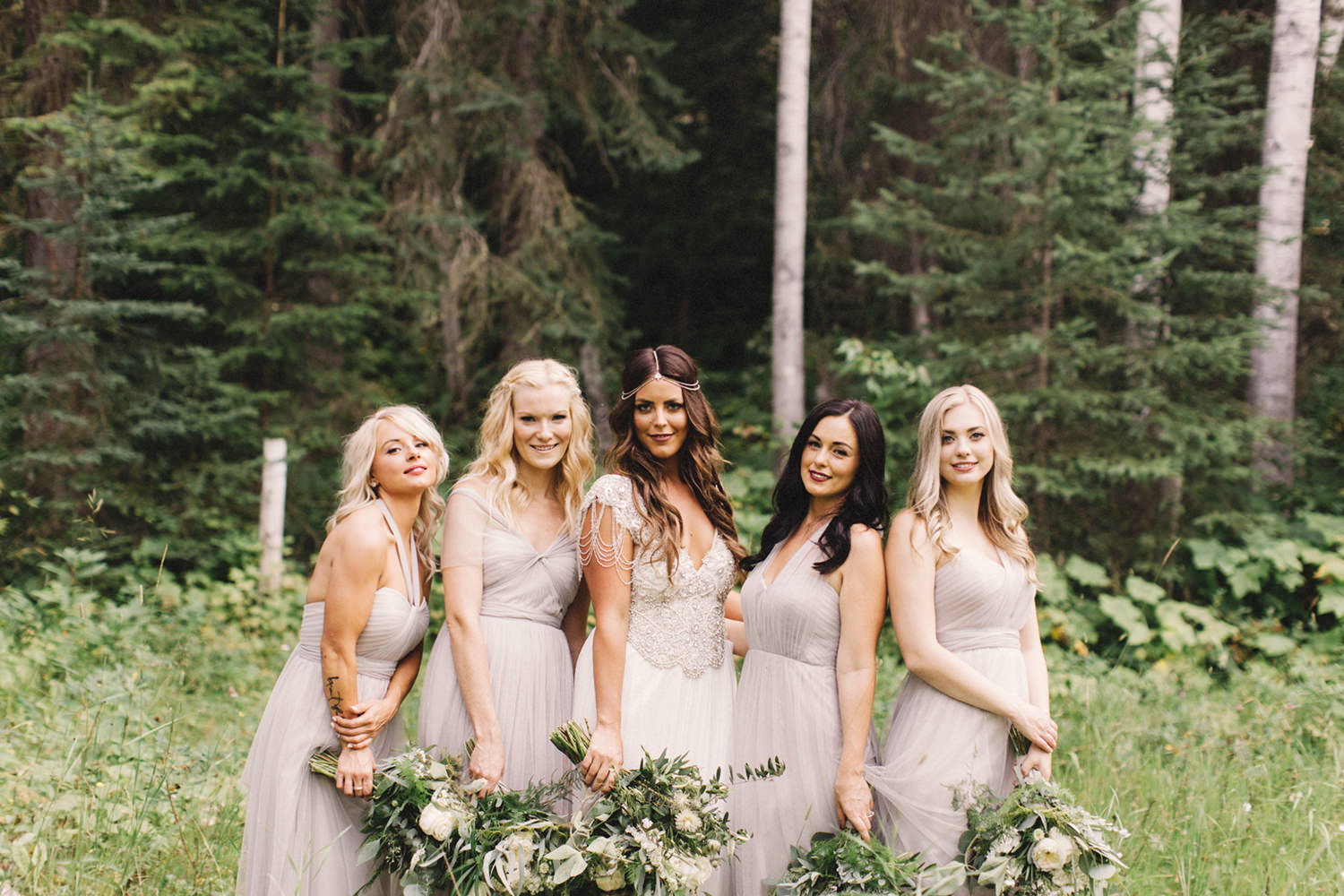 bride and bridesmaids, boho chic bride, boho bridesmaids, bride with hair down, golden wedding, hillside chalets wedding